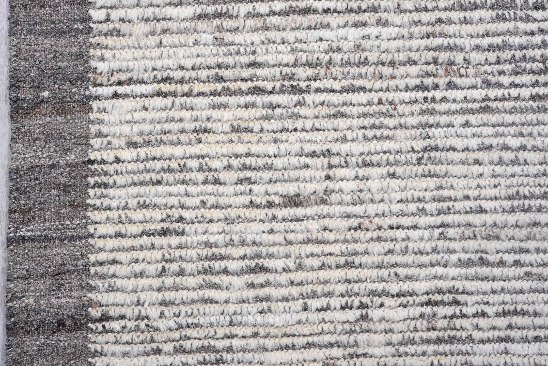 3' x 11' one-of-a-kind handmade vintage Tulu runner rug. Color palette: light gray, gray, off-white, blue, black, silver