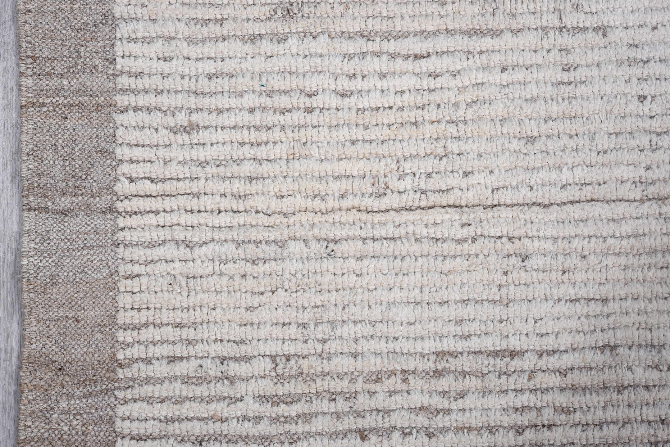3' x 10' one-of-a-kind handmade vintage Tulu runner rug. Color palette: ivory, taupe, gray, cream, beige
