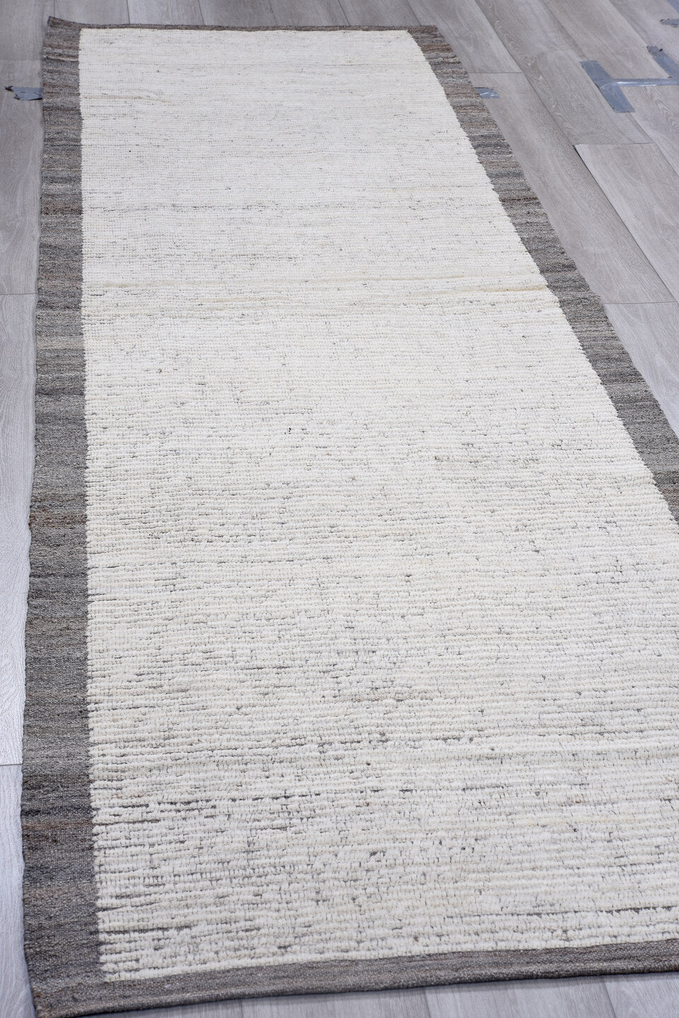 3' x 10' one-of-a-kind handmade vintage Tulu runner rug. Color palette: ivory, charcoal, gray, black