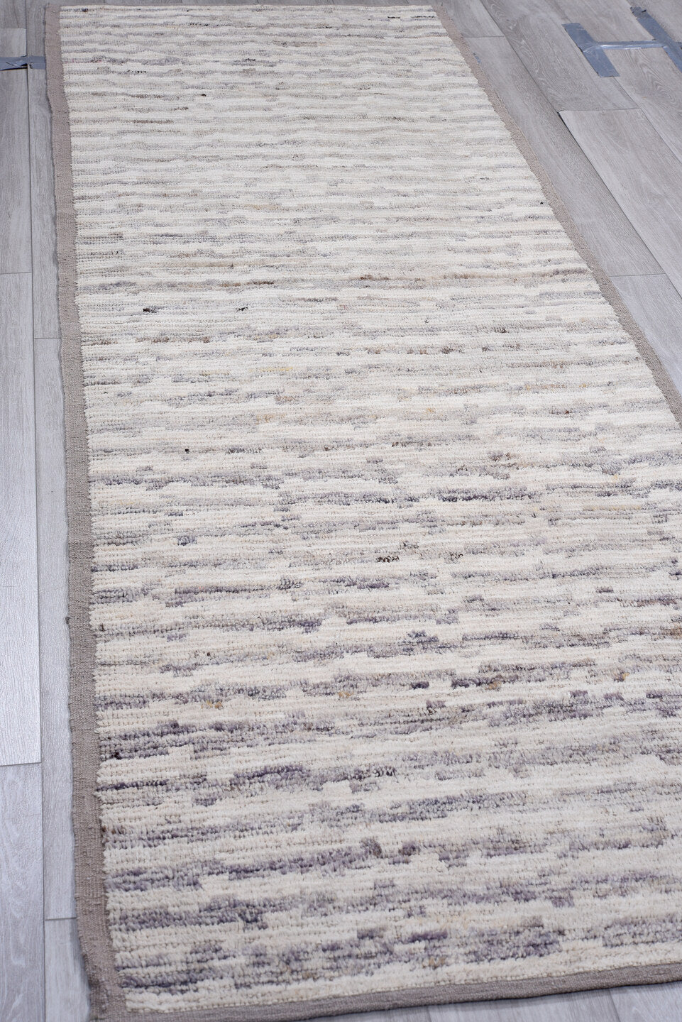 3' x 9' one-of-a-kind handmade vintage Tulu runner rug. Color palette: ivory, gray, taupe, charcoal, cream, beige, black