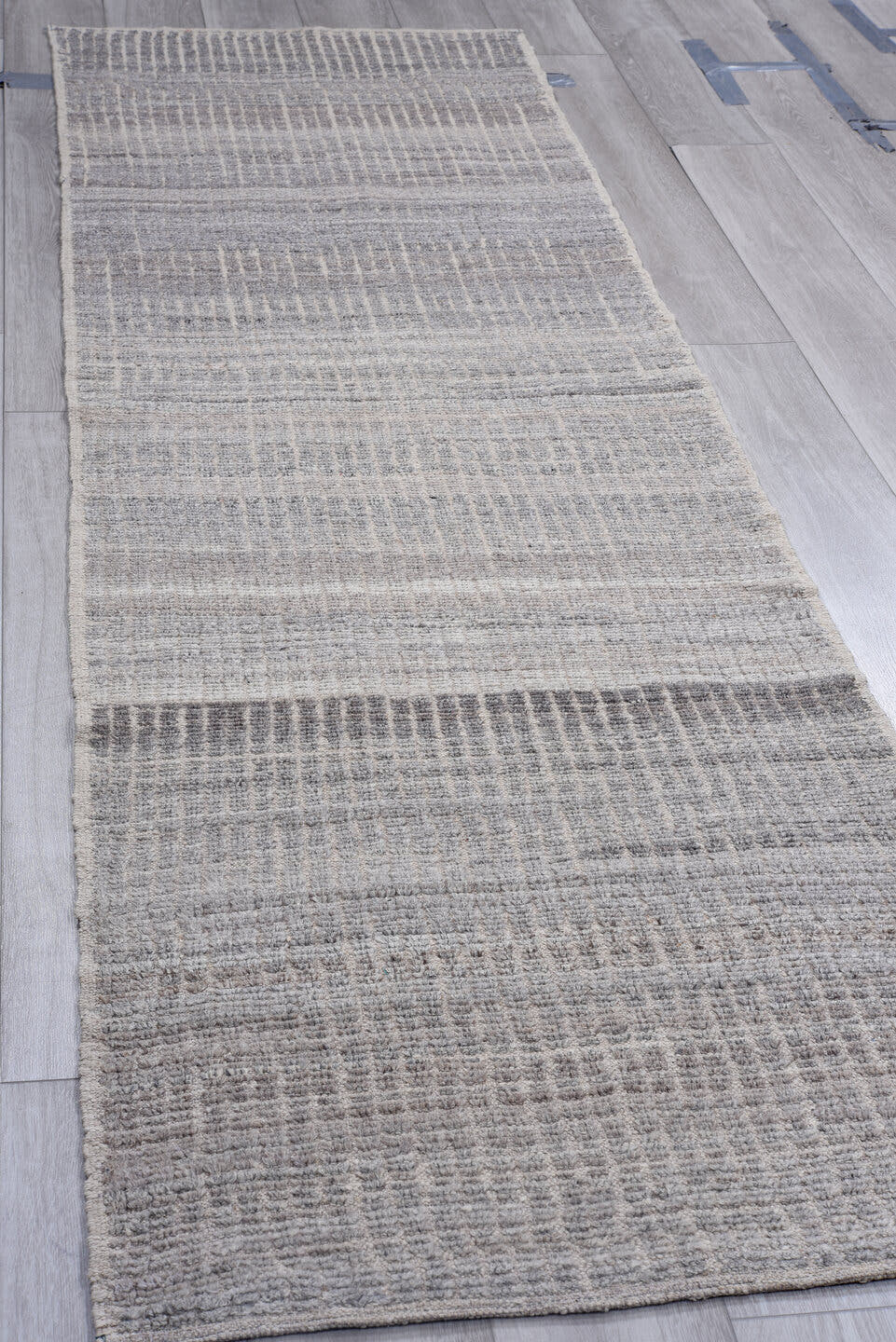 2' x 9' one-of-a-kind handmade vintage Tulu runner rug. Color palette: gray, ivory, charcoal, taupe, black, beige