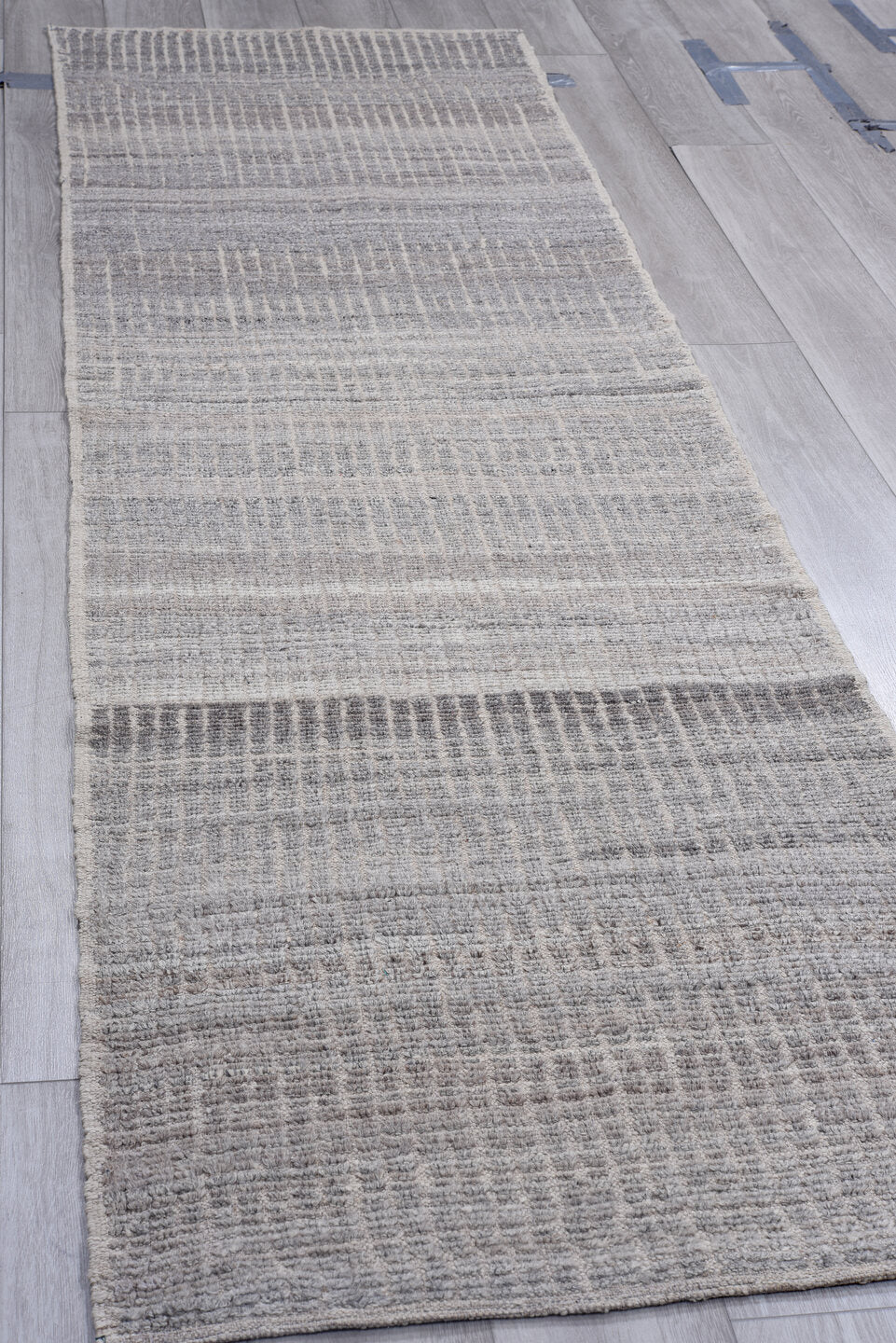 2' x 9' one-of-a-kind handmade vintage Tulu runner rug. Color palette: gray, ivory, charcoal, taupe, black, beige