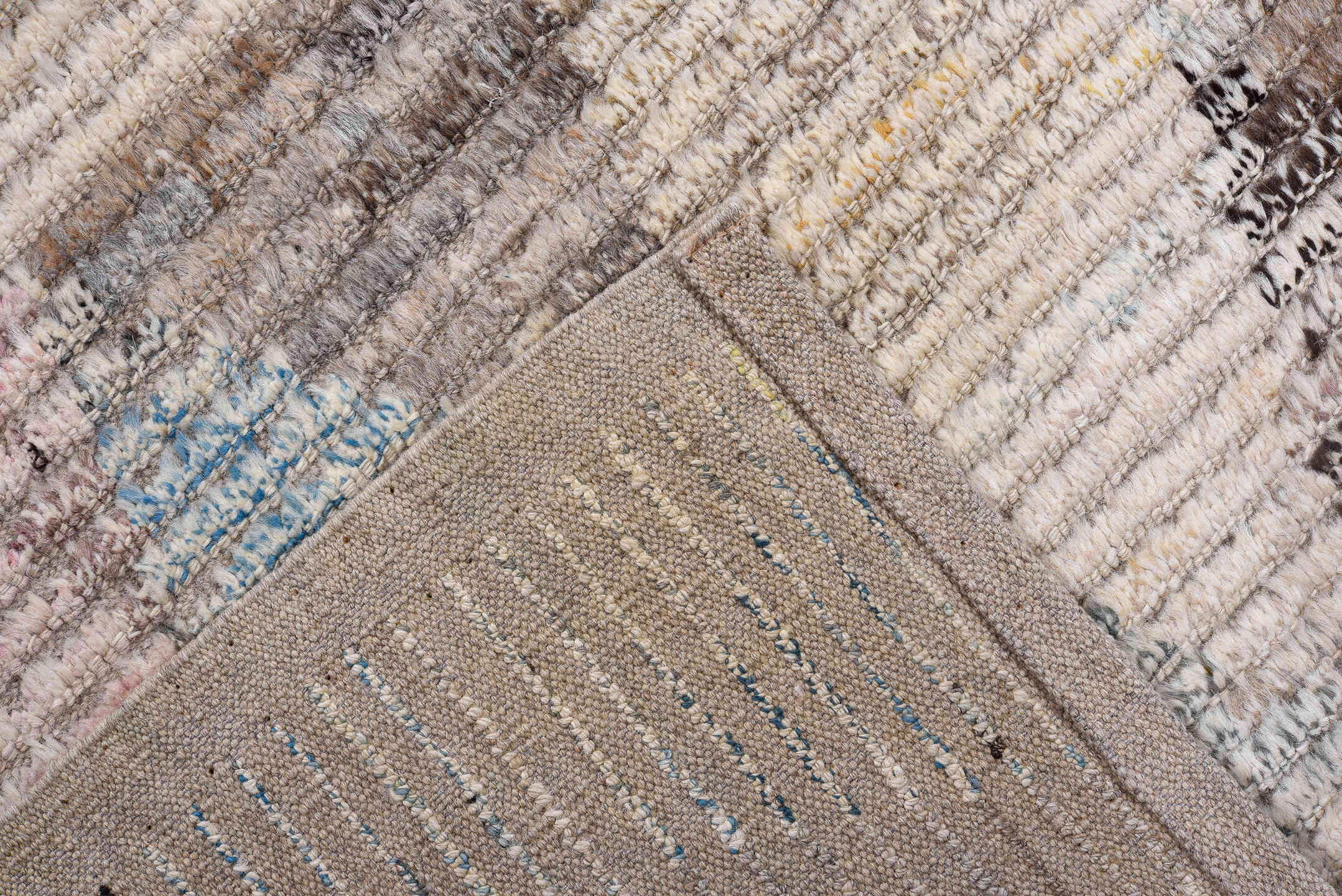 3' x 9' one-of-a-kind handmade vintage Tulu runner rug. Color palette: ivory, taupe, gray, charcoal, sky blue, blush, rust