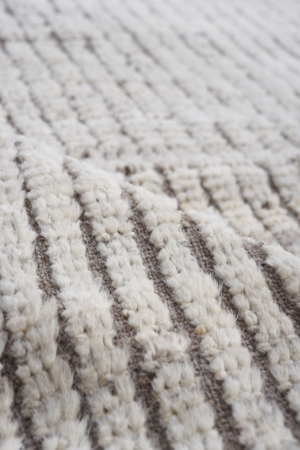 8' x 11' one-of-a-kind handmade vintage Tulu large size rug. Color palette: ivory, taupe, brown, gray, beige