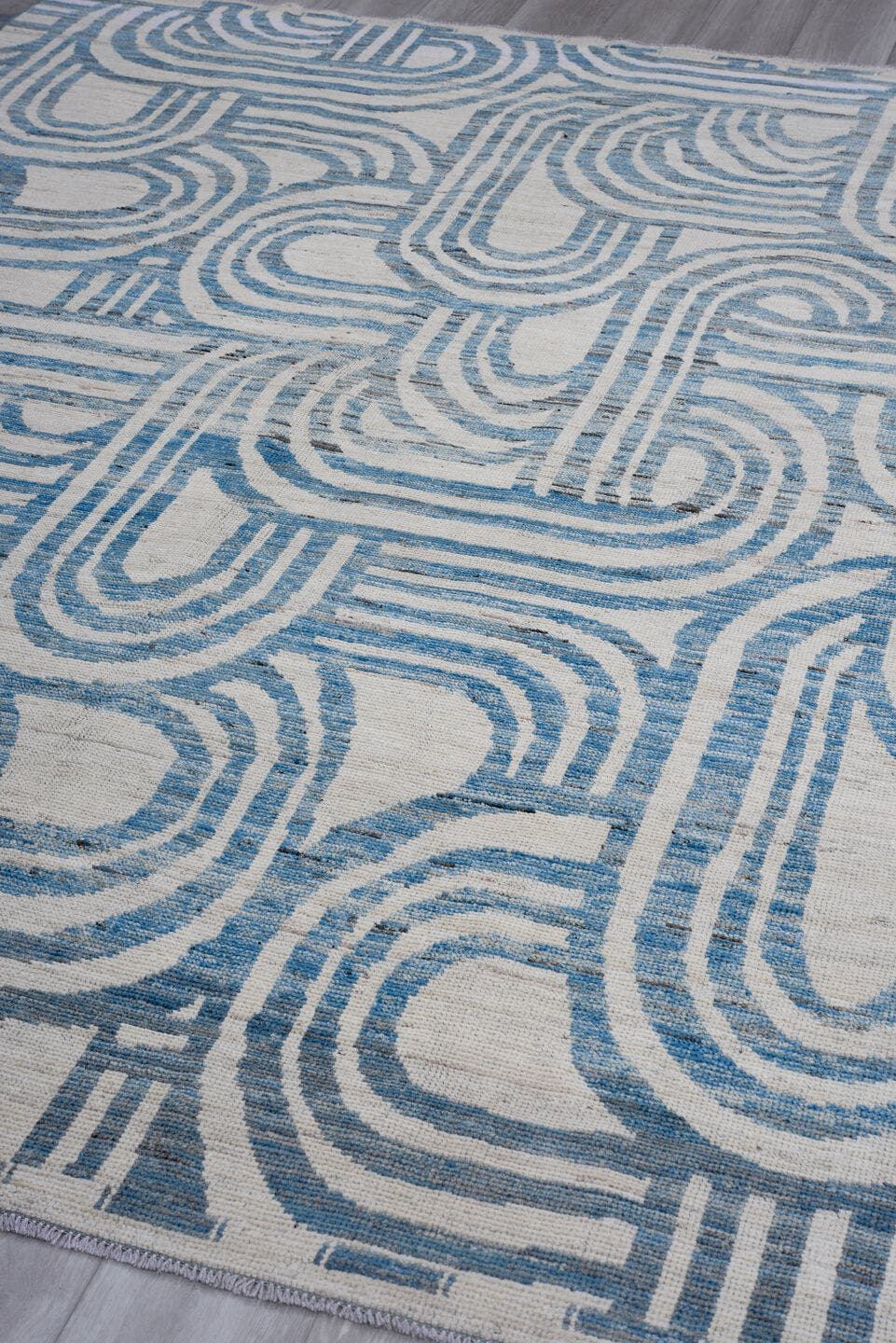 7' x 9' one-of-a-kind handmade vintage Tulu large size rug. Color palette: ivory, sky blue, slate, cream, light blue, gray