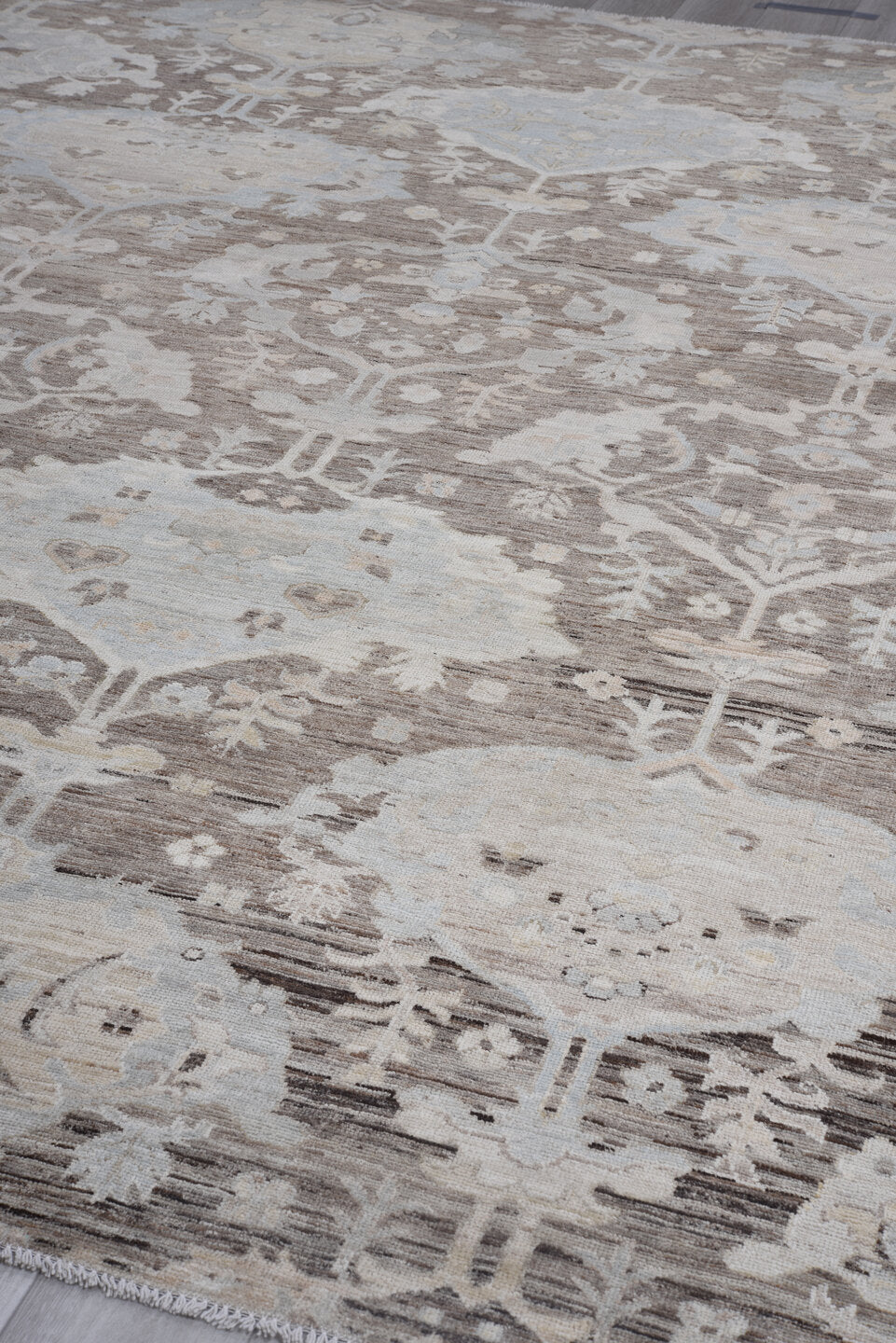 9' x 12' one-of-a-kind handmade vintage Oushak large size rug. Color palette: taupe, ivory, pale blue, brown, cream, gold