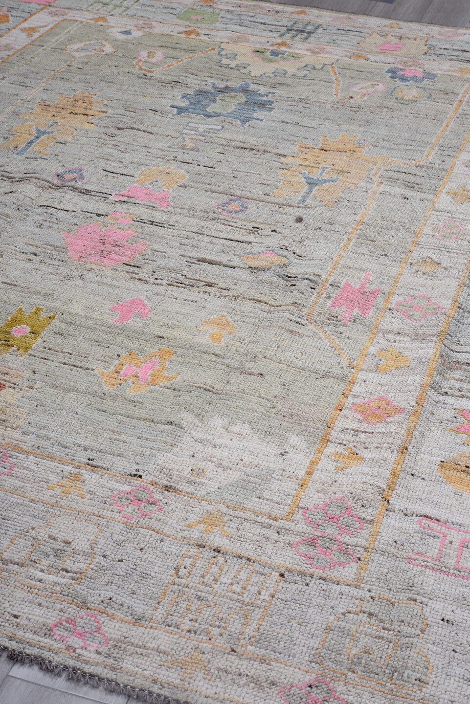 8' x 9' one-of-a-kind handmade vintage Oushak rug. Color palette: gray, blush, peach, ivory, blue, olive, gold, taupe, pink