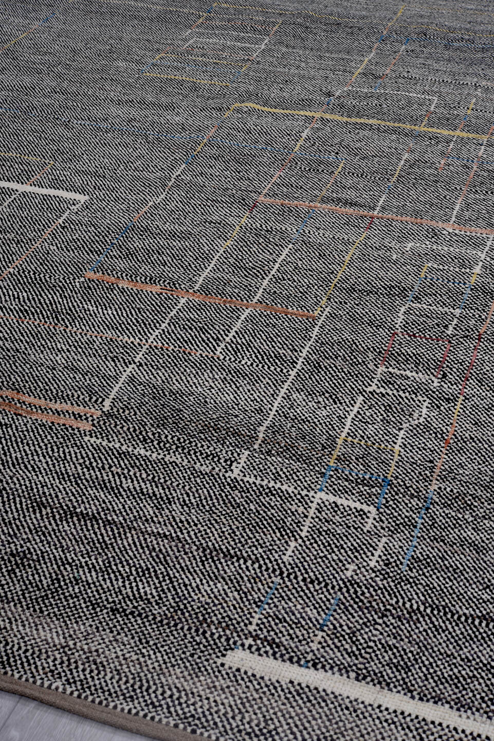 8' x 9' one-of-a-kind handmade vintage Tulu rug. Color palette: charcoal, ivory, taupe, rust, gold, slate, blue, gray, black
