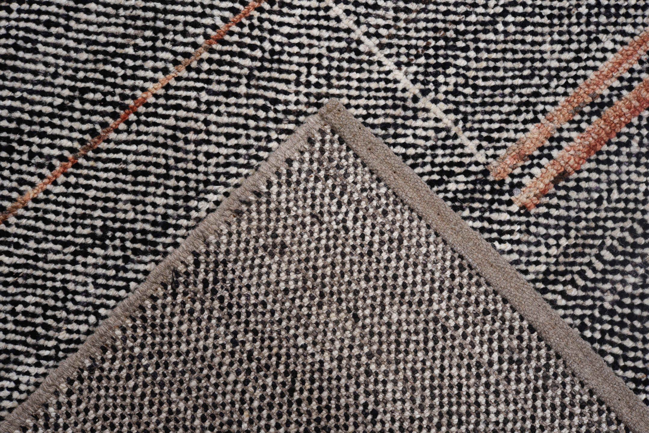 8' x 9' one-of-a-kind handmade vintage Tulu rug. Color palette: charcoal, ivory, taupe, rust, gold, slate, blue, gray, black