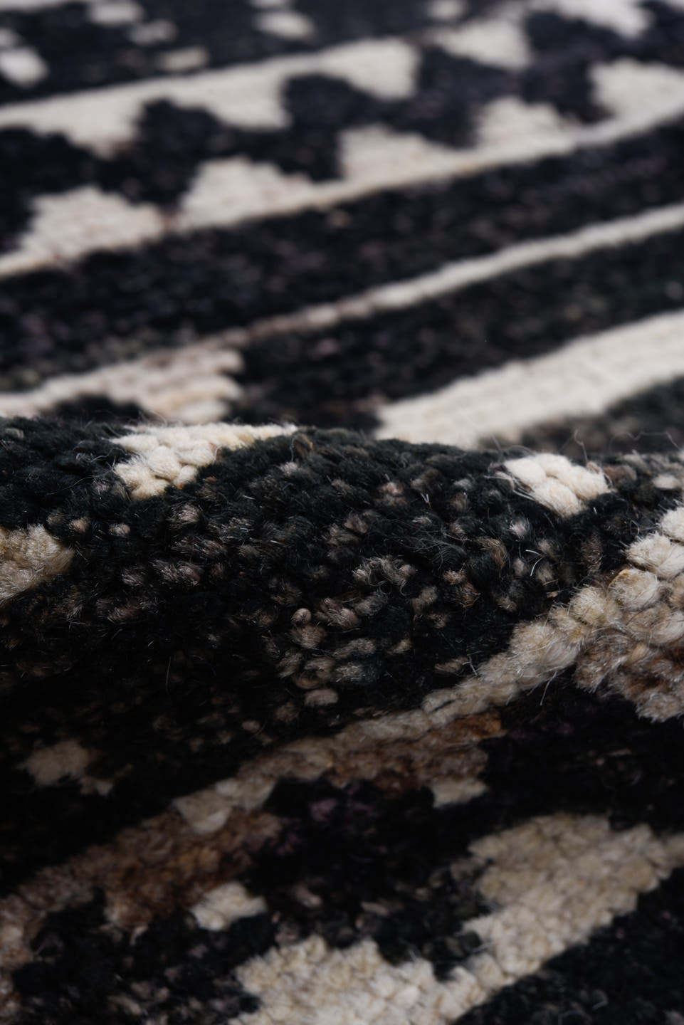 9' x 11' one-of-a-kind handmade vintage Tulu large size rug. Color palette: ivory, black, charcoal, gray