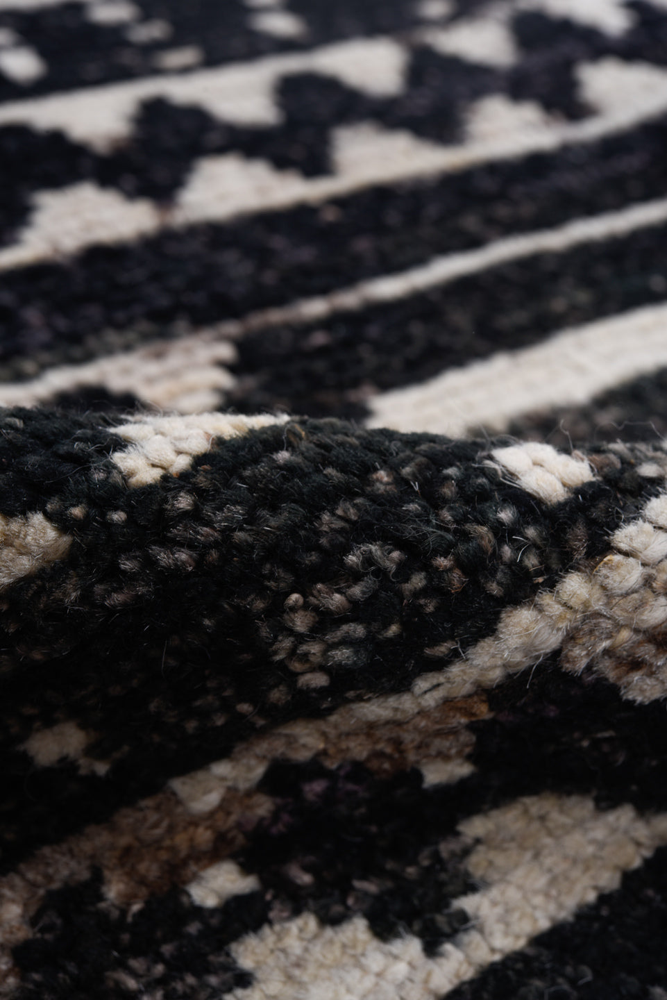 9' x 11' one-of-a-kind handmade vintage Tulu large size rug. Color palette: ivory, black, charcoal, gray