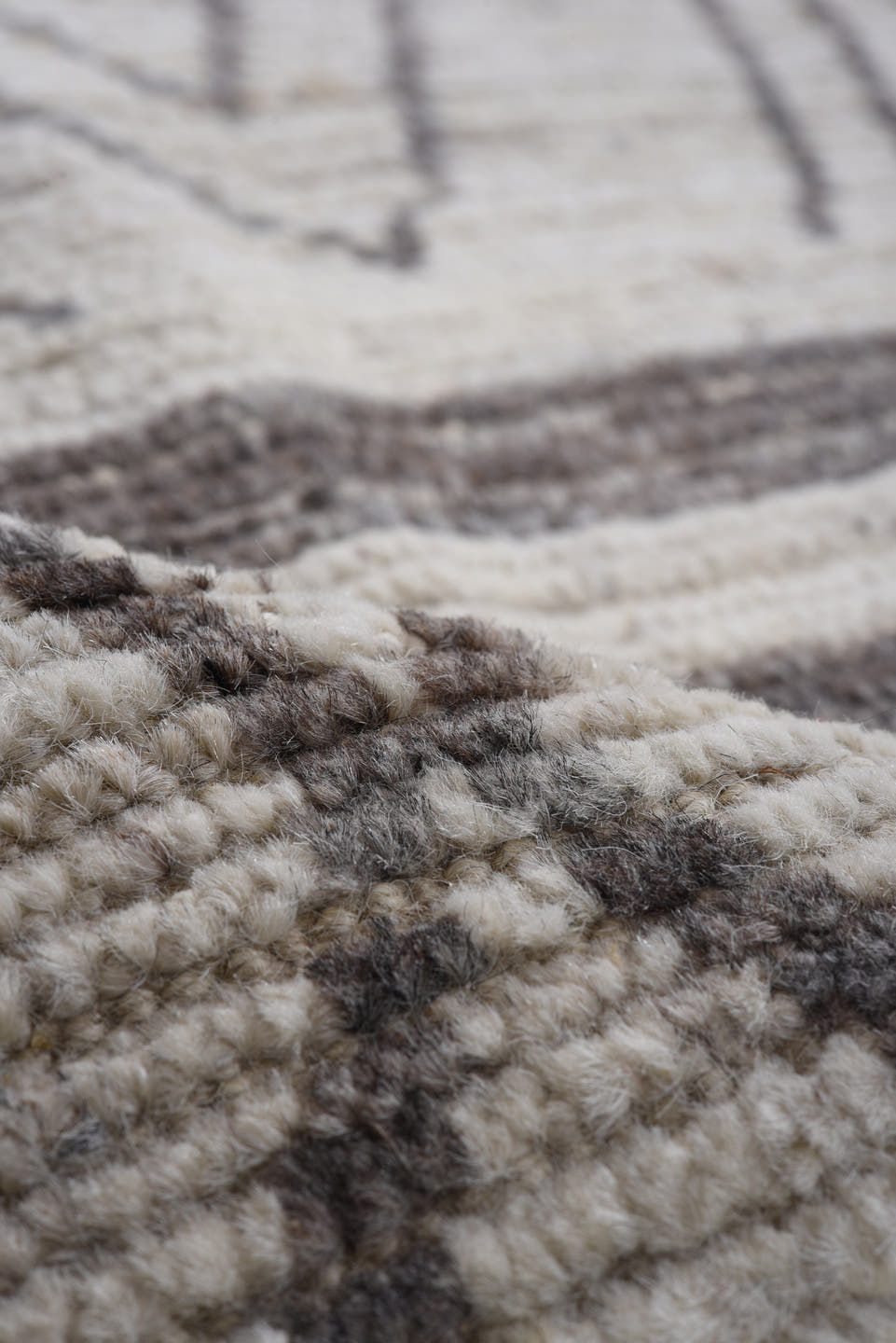9' x 11' one-of-a-kind handmade vintage Tulu large size rug. Color palette: ivory, charcoal, taupe, gray, black, beige