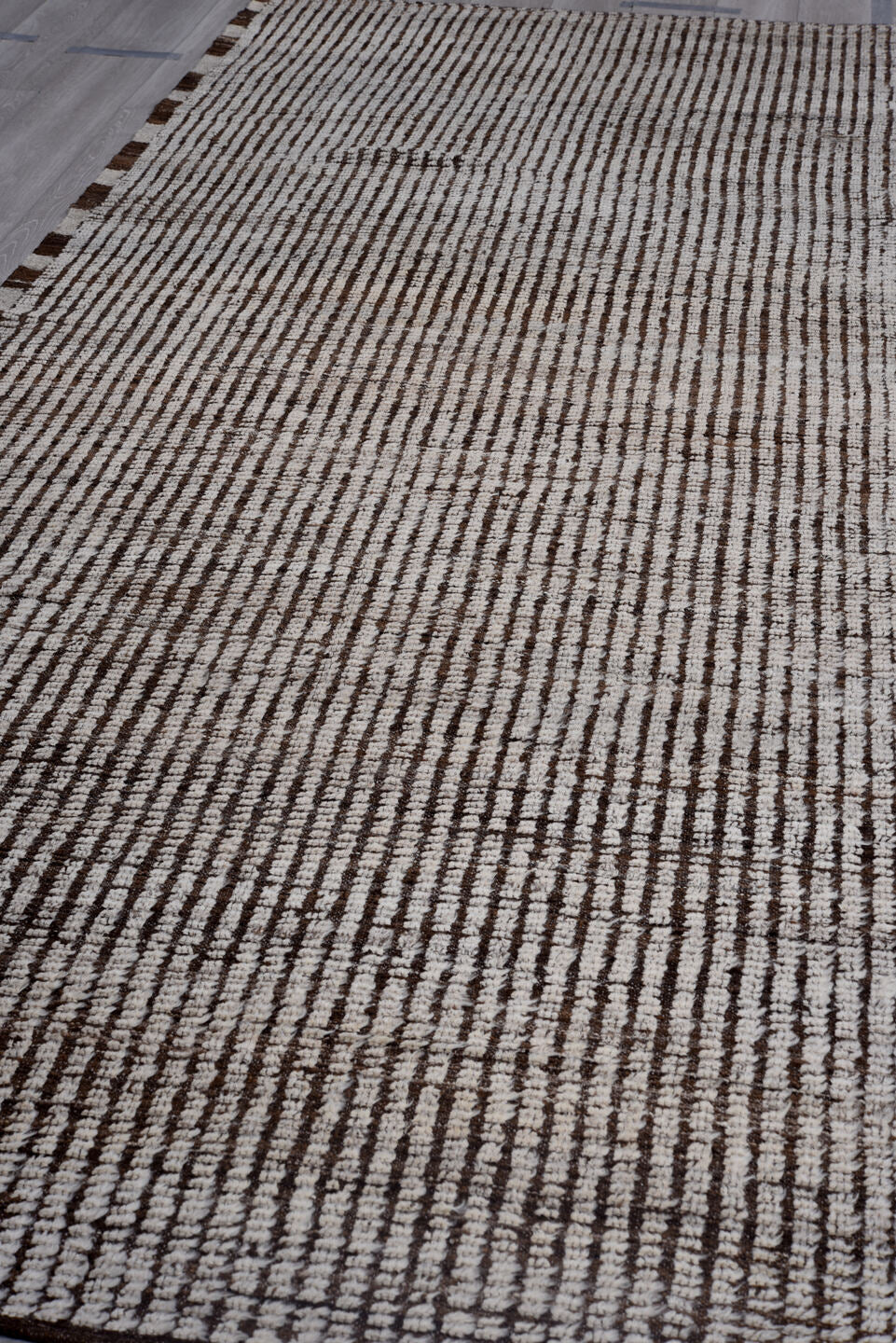 4' x 12' one-of-a-kind handmade vintage Tulu runner rug. Color palette: ivory, brown, espresso, black