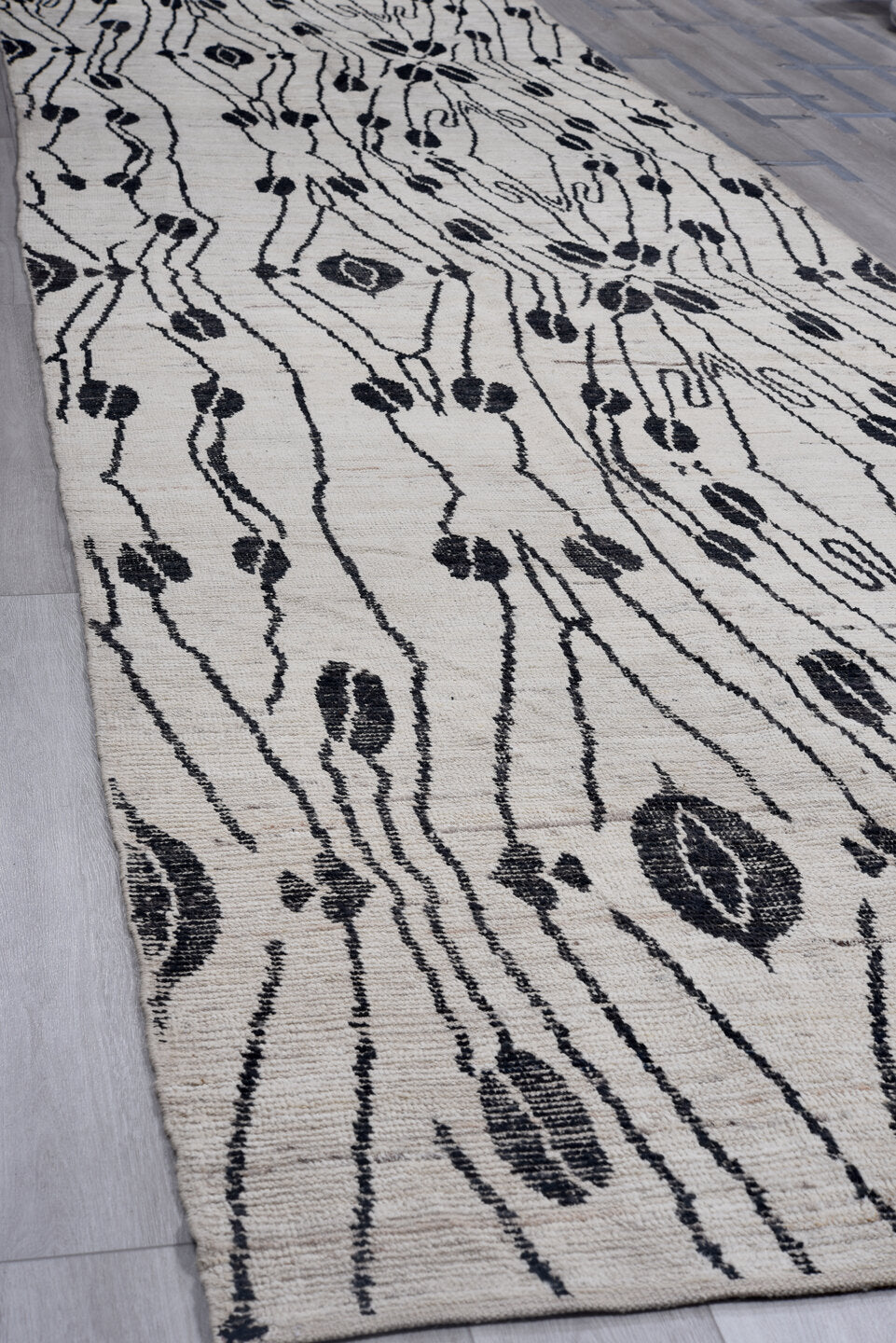 5' x 19' one-of-a-kind handmade vintage Tulu rug. Color palette: ivory, black, charcoal, gray