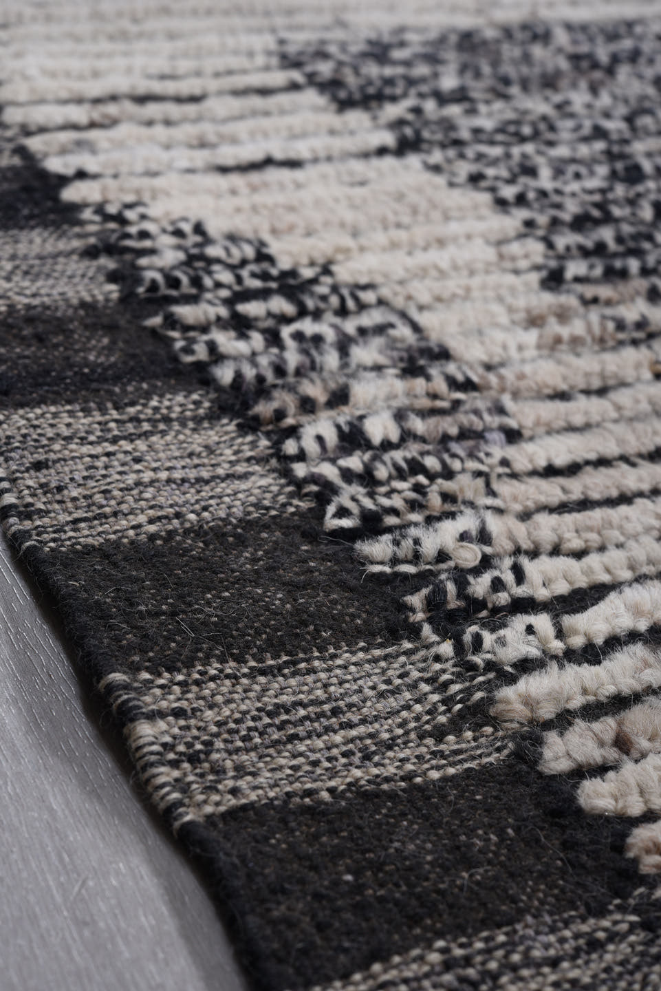 9' x 12' one-of-a-kind handmade vintage Tulu large size rug. Color palette: ivory, charcoal, black, gray