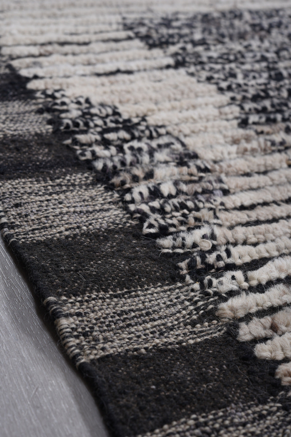 9' x 12' one-of-a-kind handmade vintage Tulu large size rug. Color palette: ivory, charcoal, black, gray