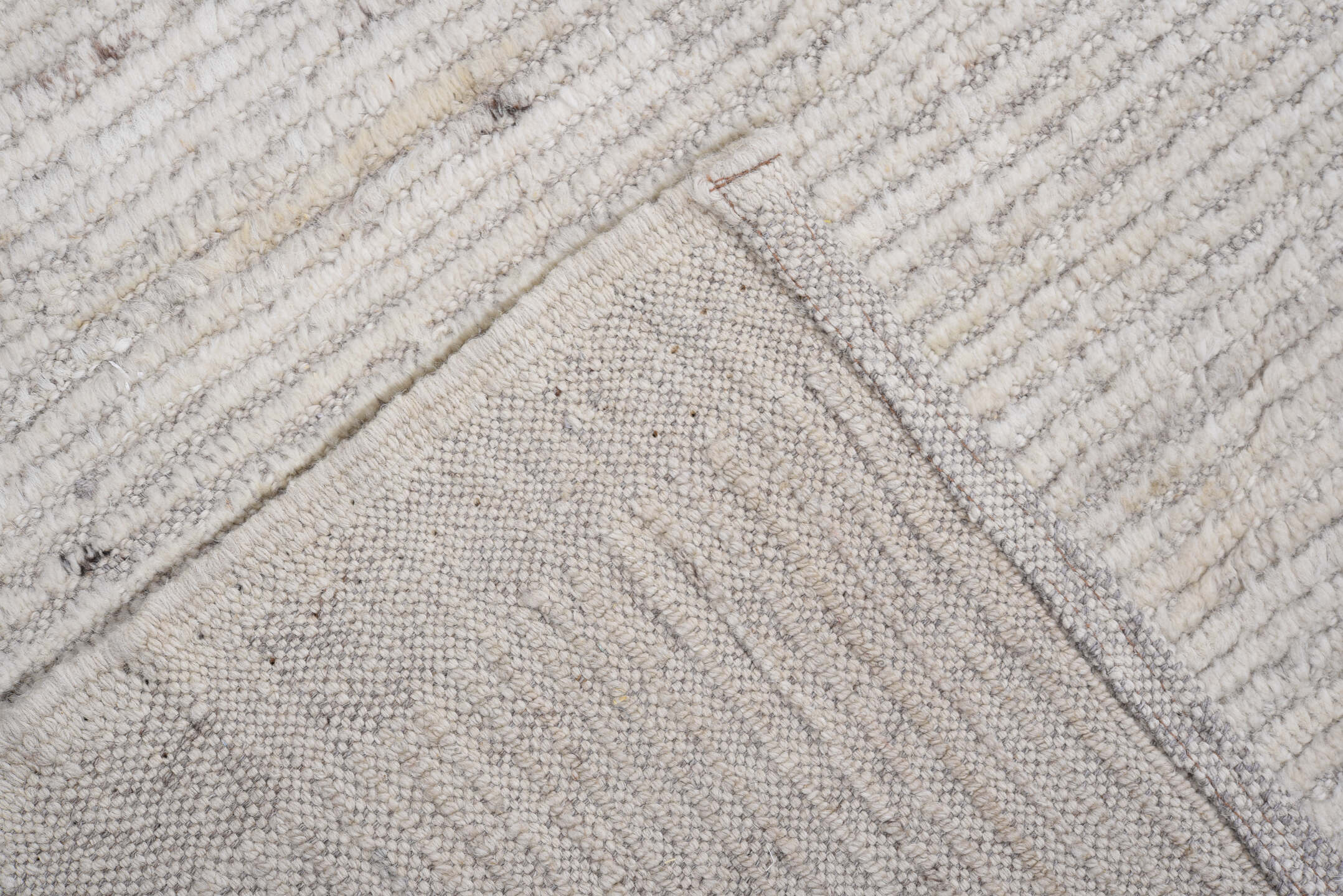 8' x 9' one-of-a-kind handmade vintage Tulu rug. Color palette: ivory, cream, taupe, light gray, beige, charcoal, gray