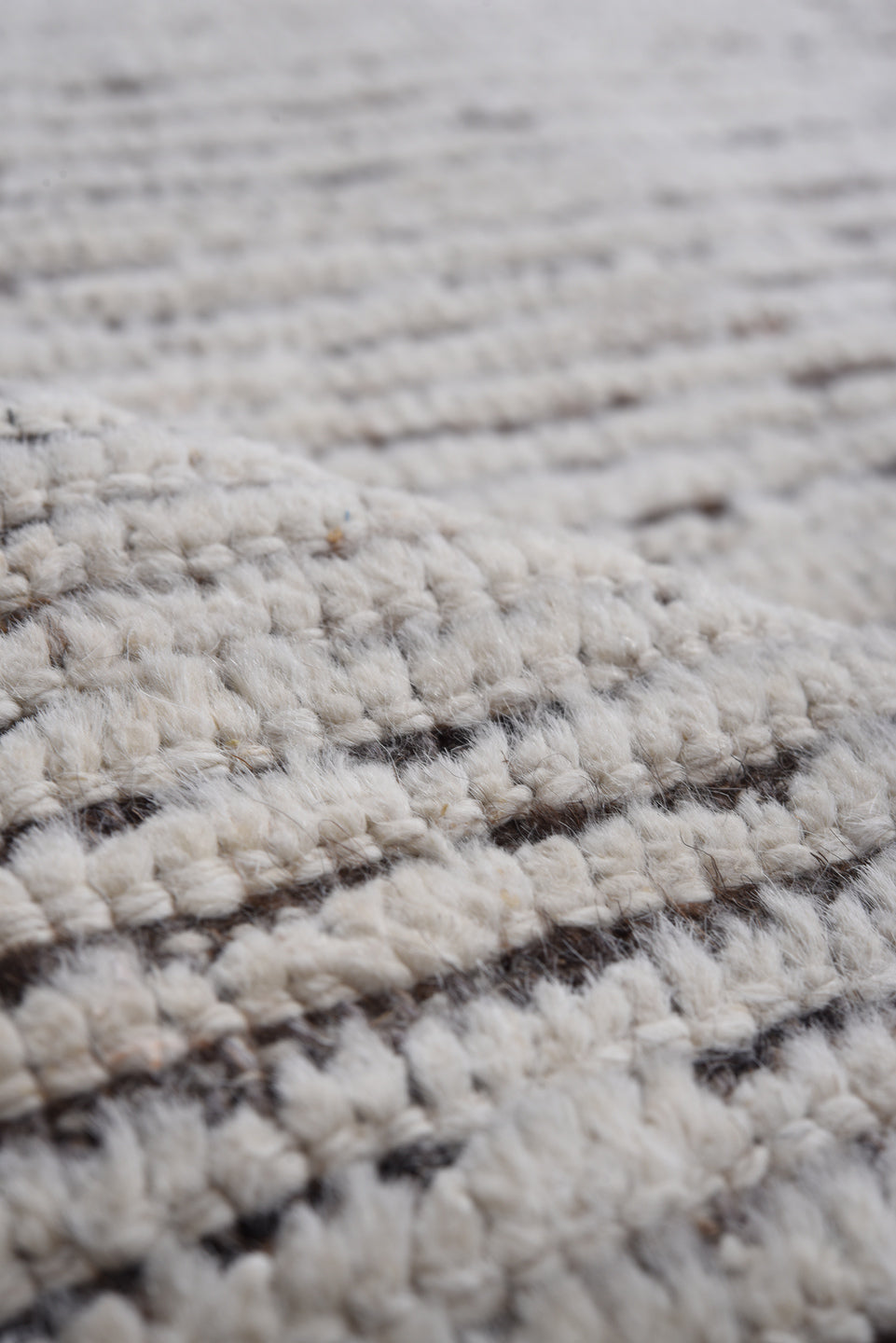 9' x 11' one-of-a-kind handmade vintage Tulu large size rug. Color palette: ivory, charcoal, taupe, brown, gray, black