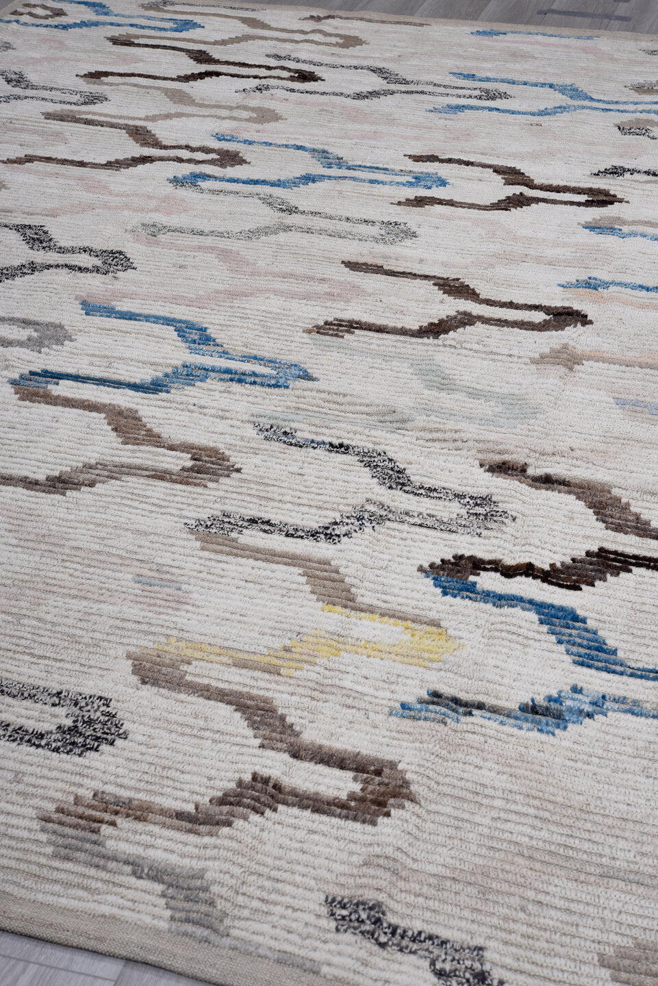 8' x 11' one-of-a-kind handmade vintage Tulu large size rug. Color palette: ivory, taupe, sky blue, gray, brown, charcoal