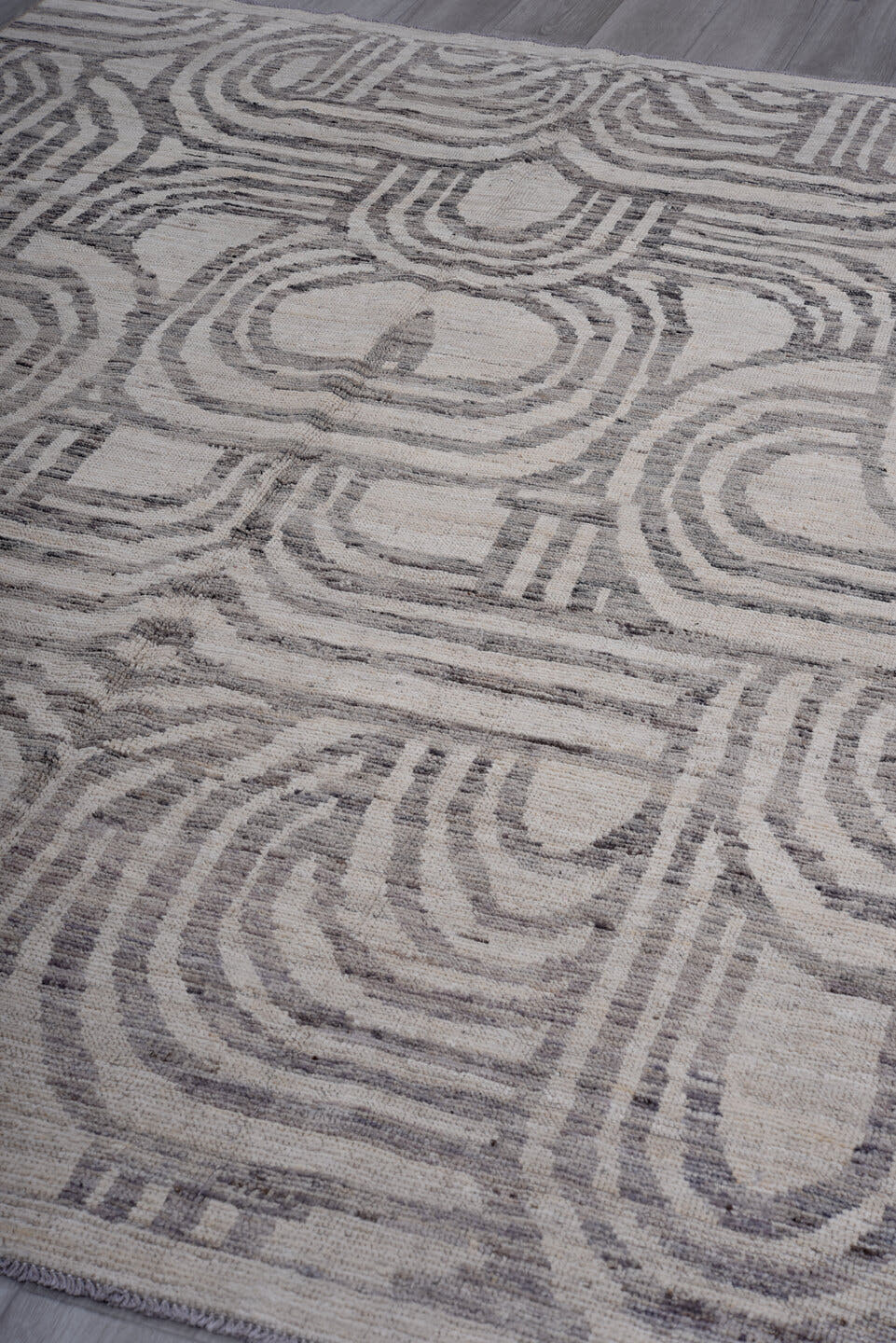 7' x 9' one-of-a-kind handmade vintage Tulu rug. Color palette: ivory, gray, charcoal, taupe, black, beige