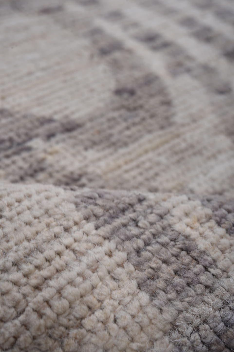 7' x 9' one-of-a-kind handmade vintage Tulu rug. Color palette: ivory, gray, charcoal, taupe, black, beige