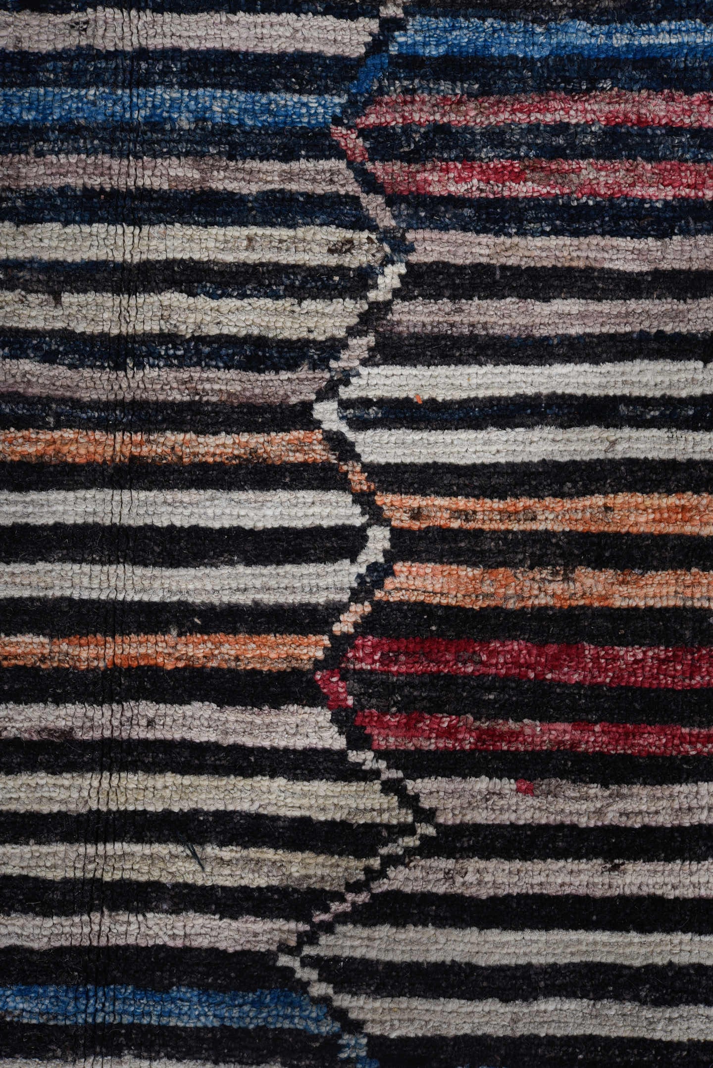 9' x 11' one-of-a-kind handmade vintage Tulu large size rug. Color palette: ivory, charcoal, indigo, crimson, rust, slate