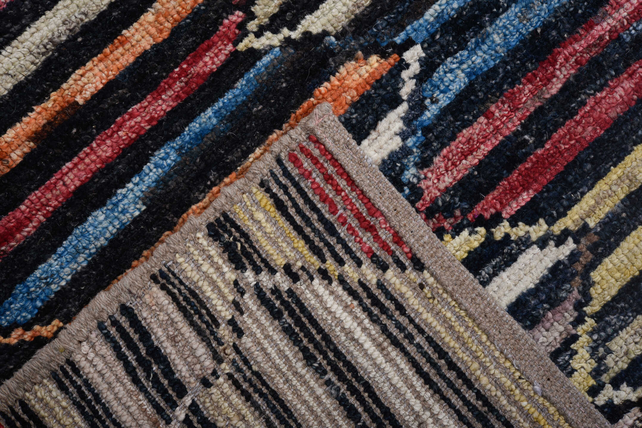 9' x 11' one-of-a-kind handmade vintage Tulu large size rug. Color palette: ivory, charcoal, indigo, crimson, rust, slate
