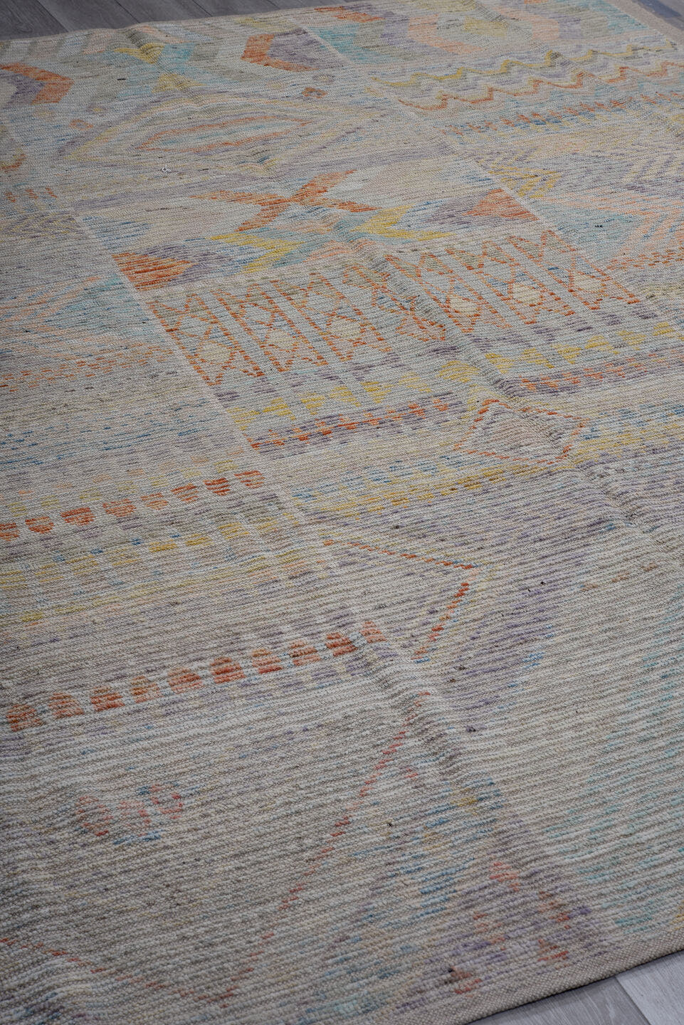 8' x 9' one-of-a-kind handmade vintage Tulu large size rug. Color palette: gray, ivory, sky_blue, peach, pale_yellow, taupe