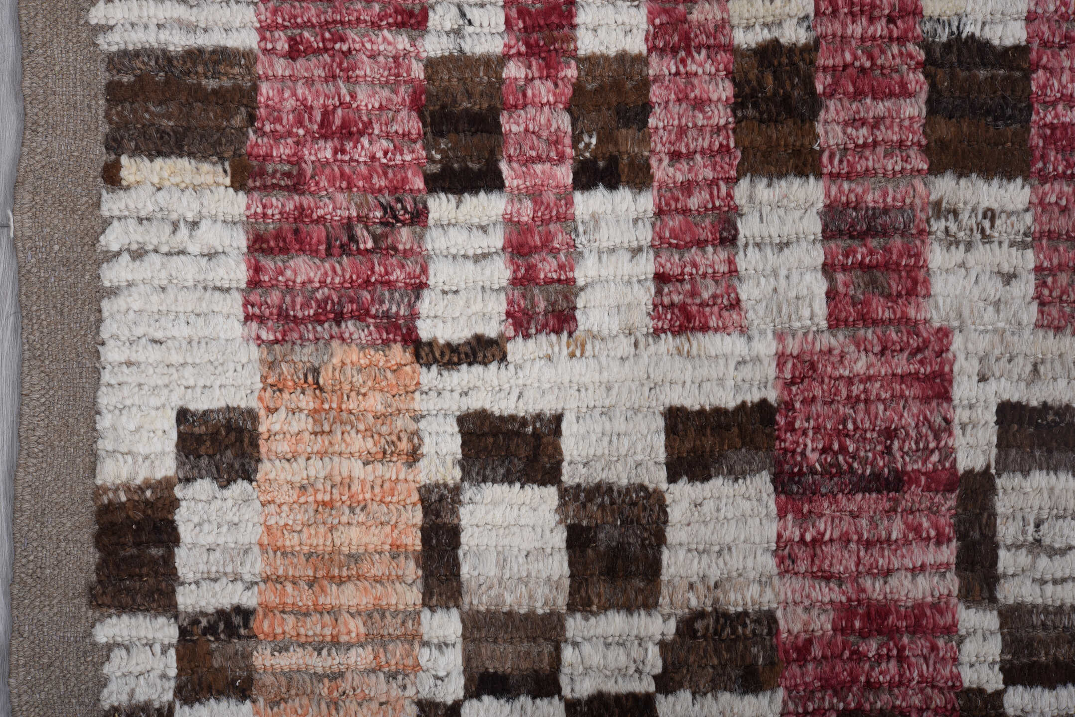 9' x 11' one-of-a-kind handmade vintage Tulu large size rug. Color palette: ivory, rose, brown, peach, taupe, charcoal, pink