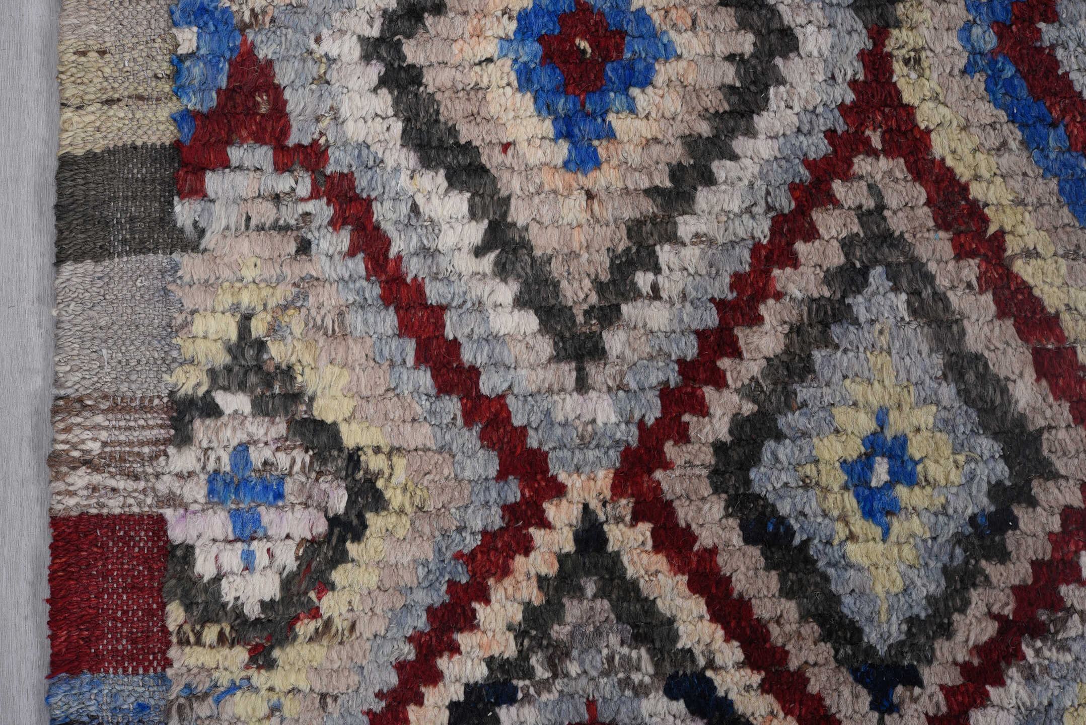 9' x 11' one-of-a-kind handmade vintage Tulu large size rug. Color palette: ivory, gray, charcoal, cobalt, burgundy, rose