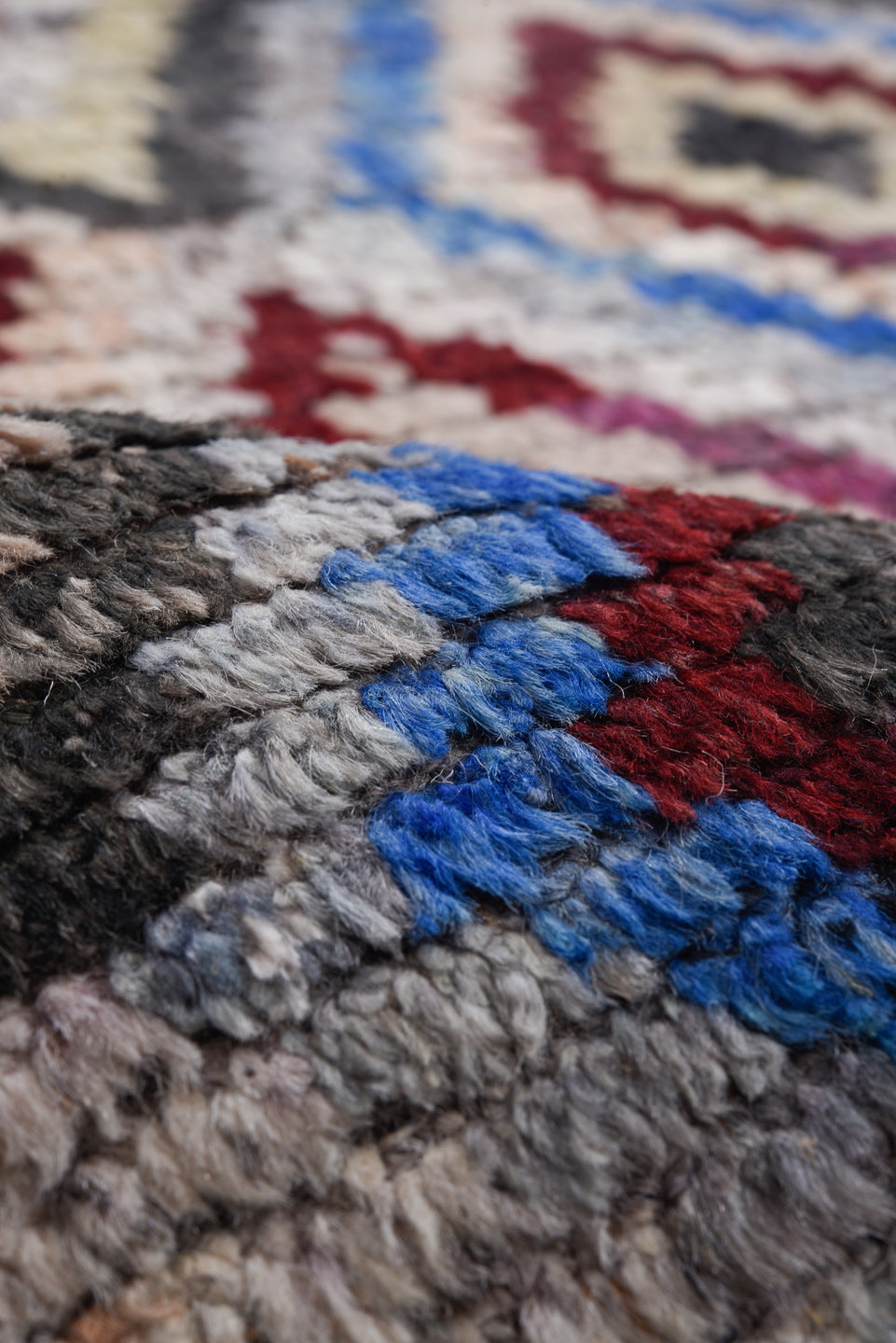 9' x 11' one-of-a-kind handmade vintage Tulu large size rug. Color palette: ivory, gray, charcoal, cobalt, burgundy, rose