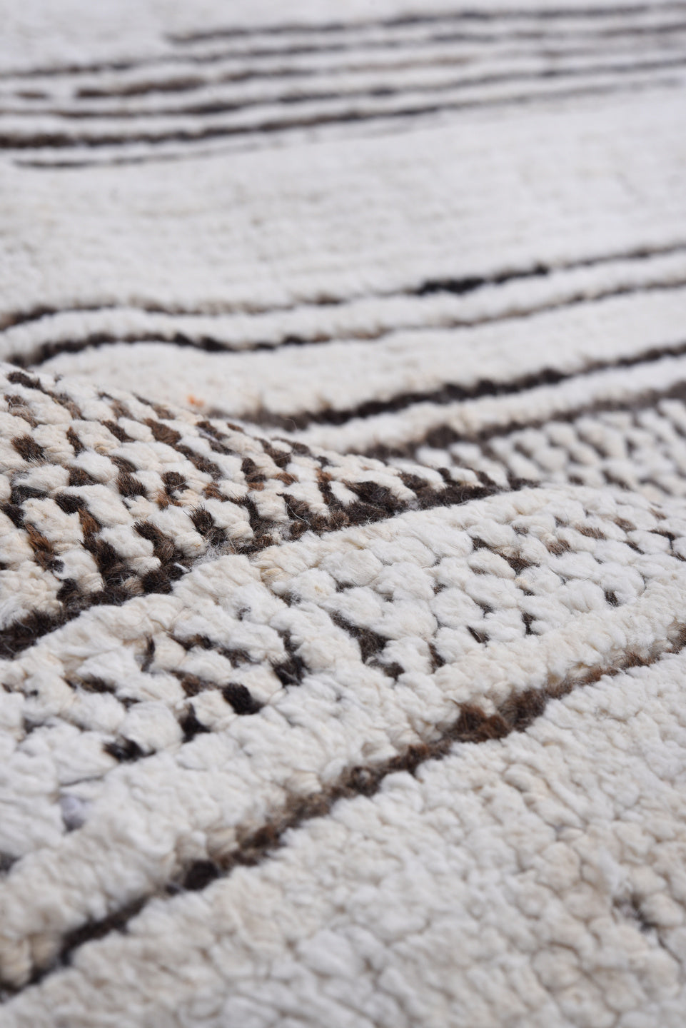 7' x 9' one-of-a-kind handmade vintage Tulu large size rug. Color palette: ivory, charcoal, gray, black
