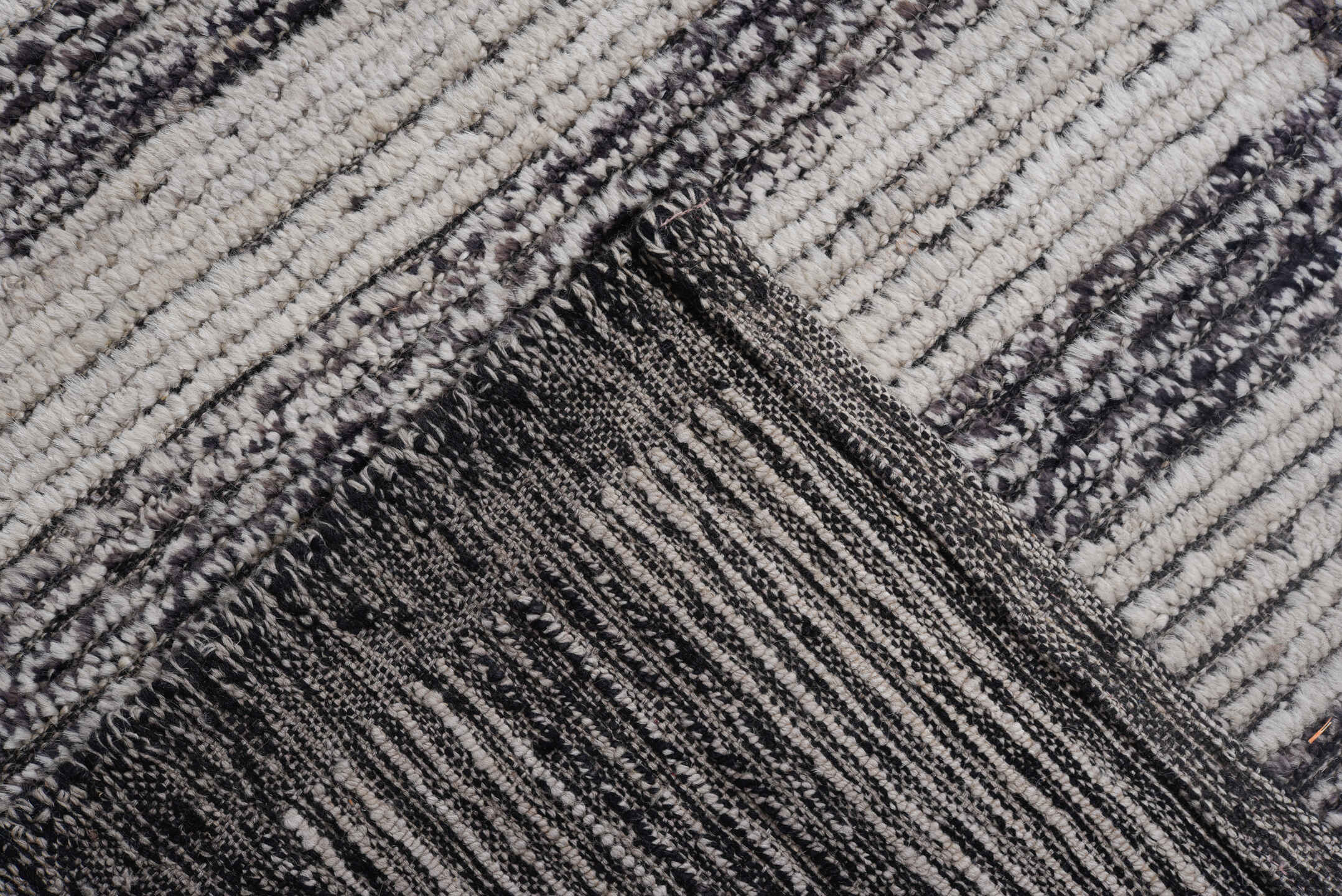 7' x 11' one-of-a-kind handmade vintage Tulu large size rug. Color palette: charcoal, ivory, gray, black