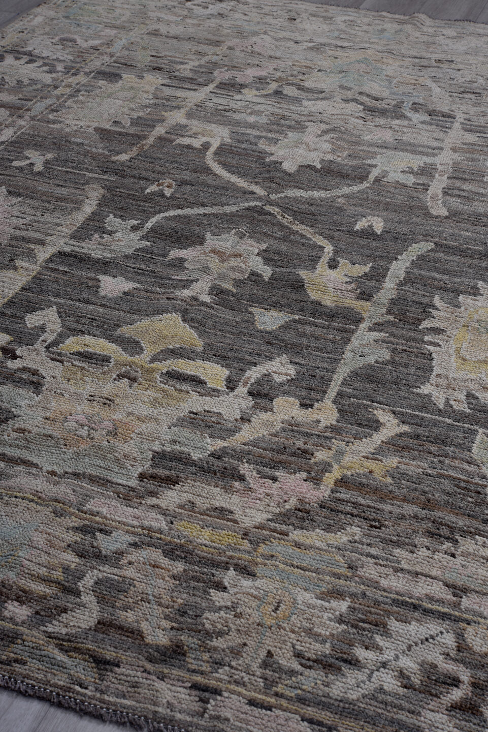 6' x 9' one-of-a-kind handmade vintage Tulu medium size rug. Color palette: charcoal, ivory, gray, taupe, gold, sage, rose