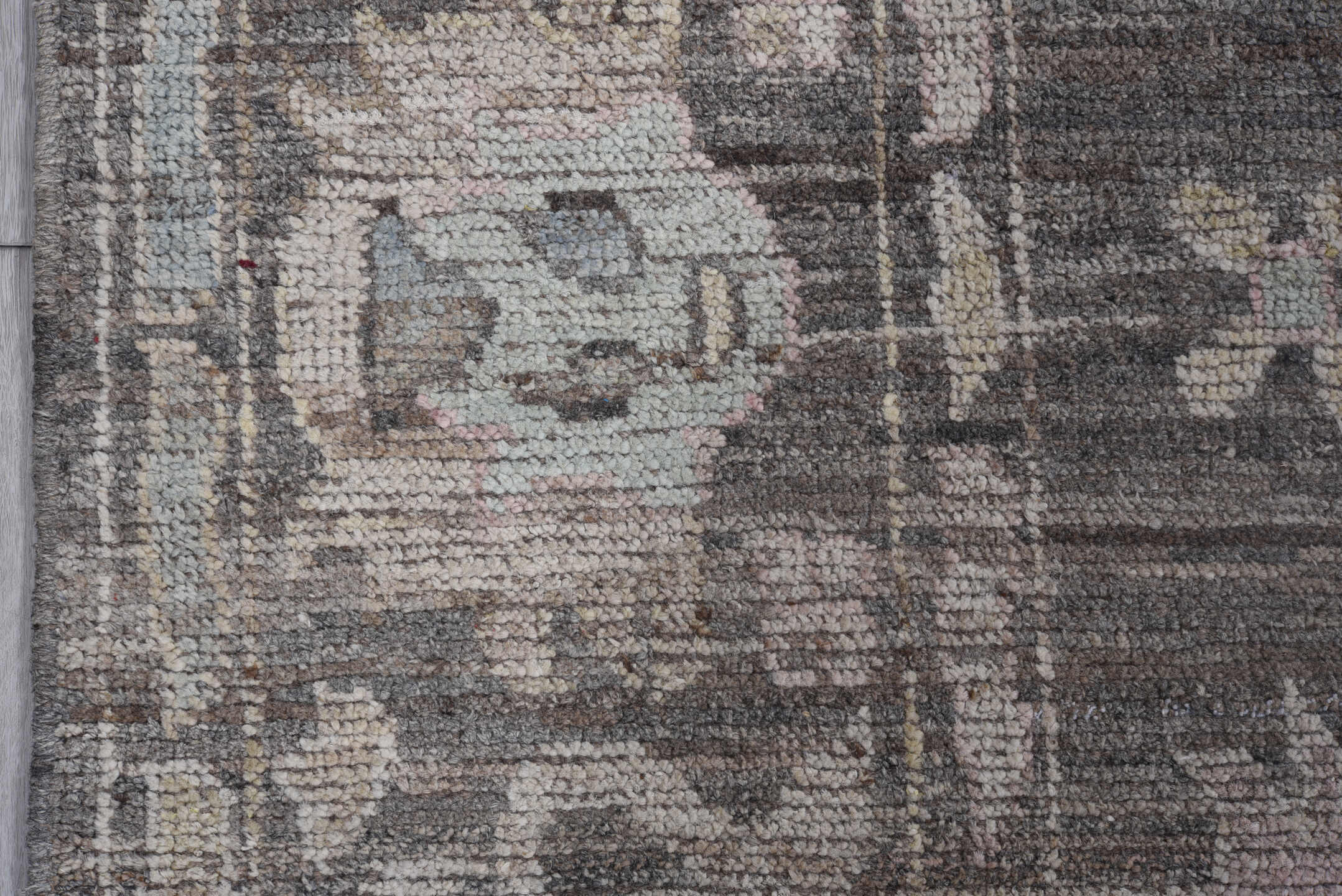 6' x 9' one-of-a-kind handmade vintage Tulu medium size rug. Color palette: charcoal, ivory, gray, taupe, gold, sage, rose