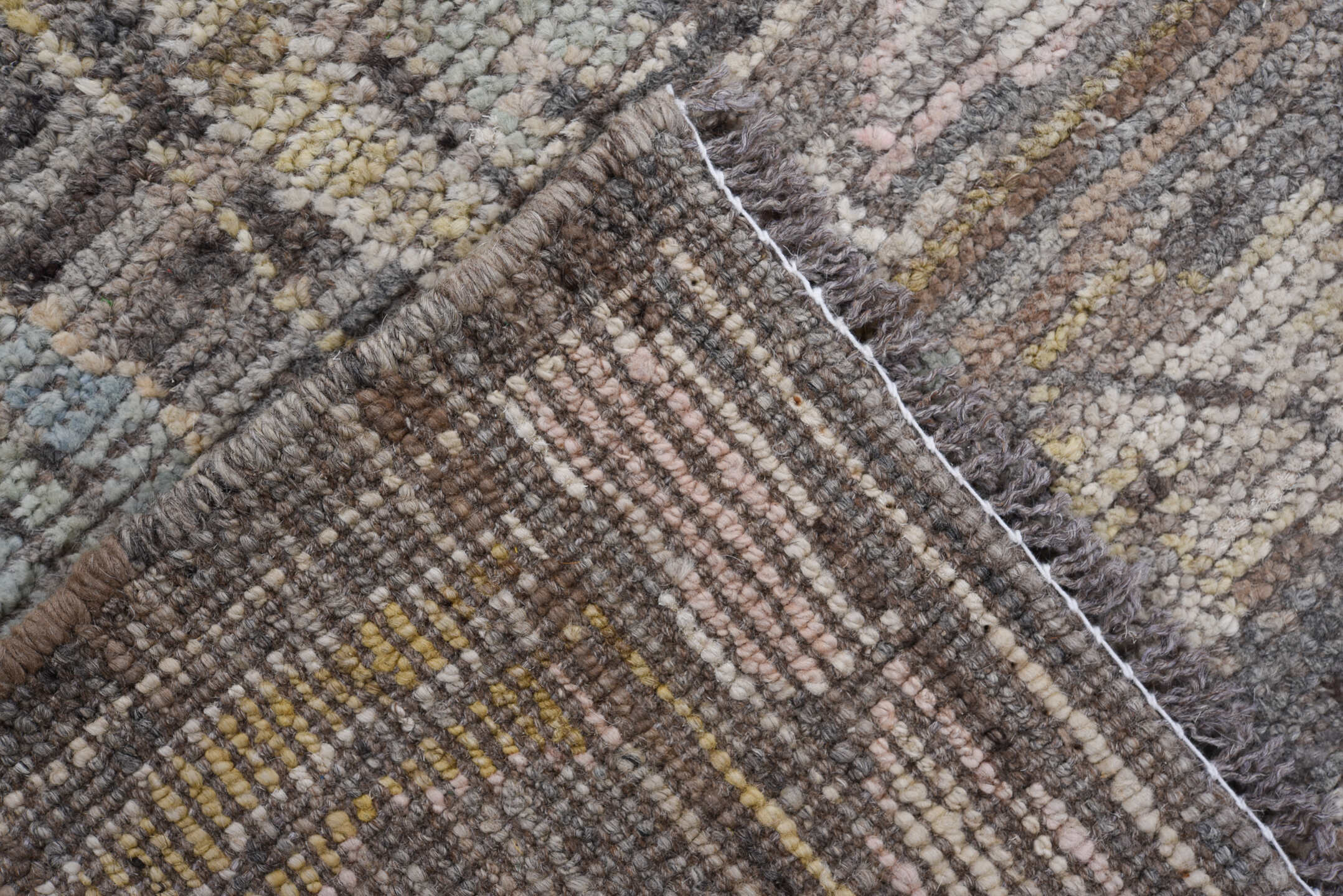 6' x 9' one-of-a-kind handmade vintage Tulu medium size rug. Color palette: charcoal, ivory, gray, taupe, gold, sage, rose