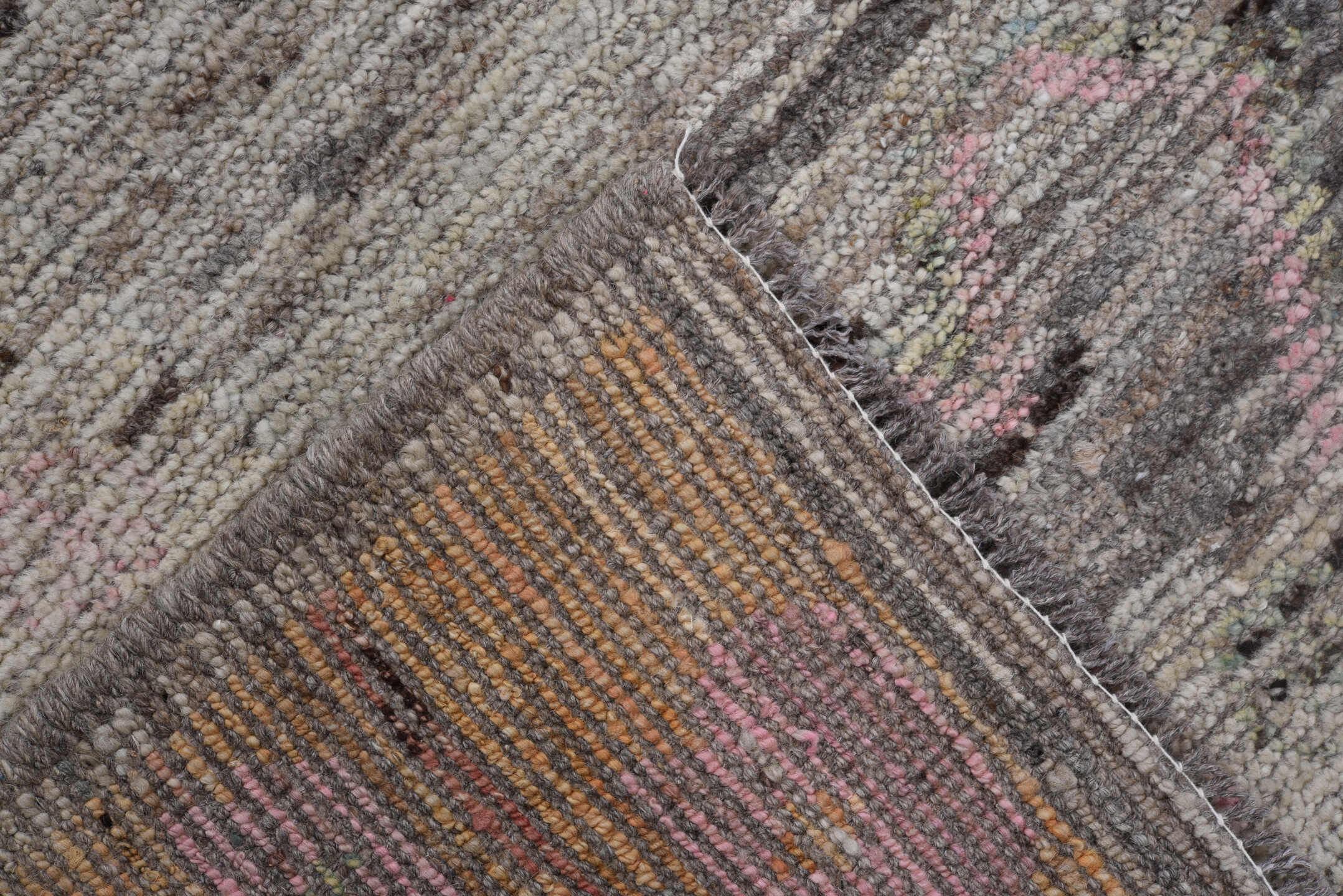 7' x 9' one-of-a-kind handmade vintage Tulu rug. Color palette: ivory, taupe, brown, blush, sage, camel, gray, beige, pink