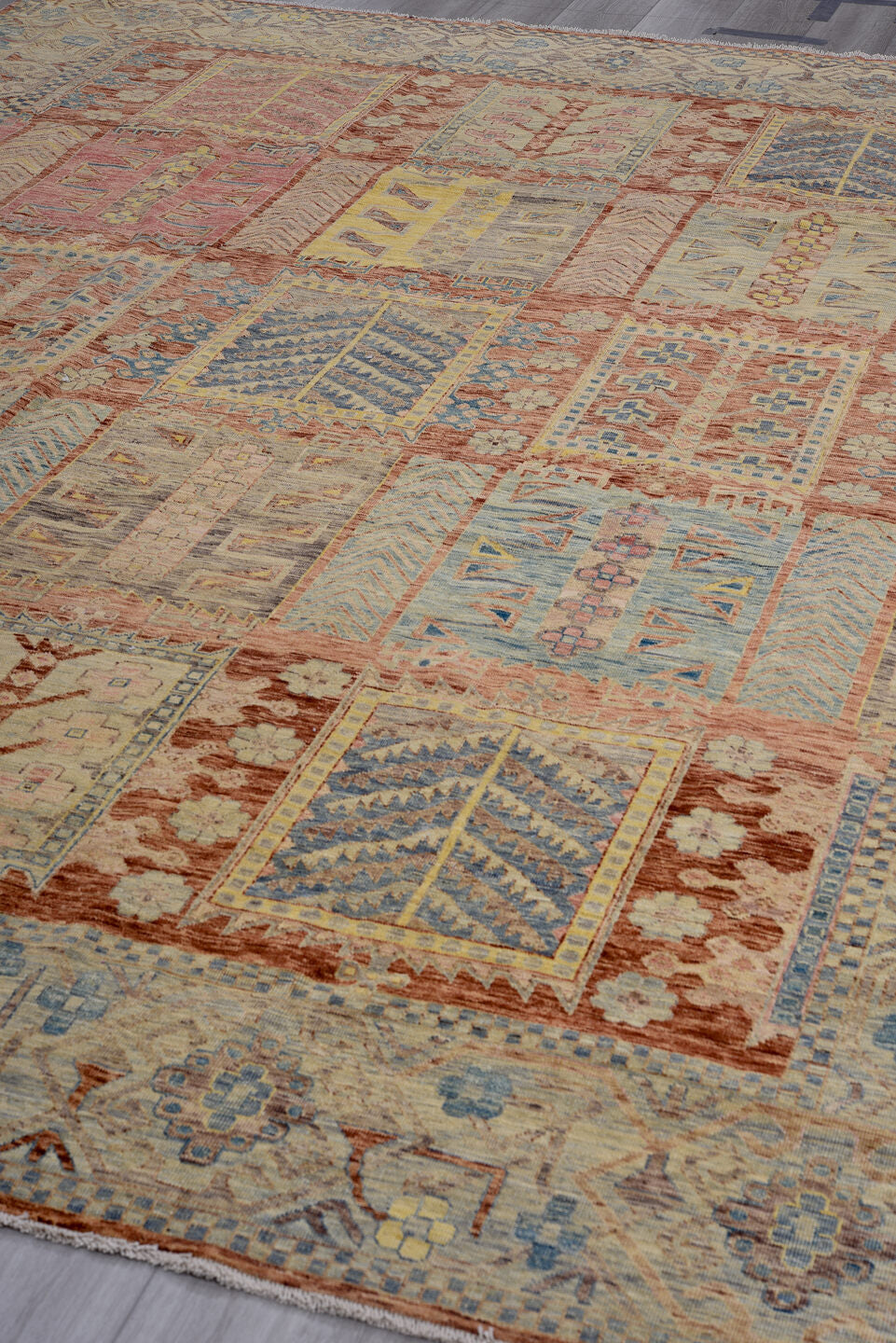 9' x 11' one-of-a-kind handmade vintage Afghan large size rug. Color palette: rust, ivory, sky blue, gold, rose, taupe