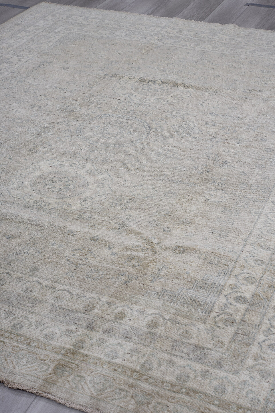 7' x 9' one-of-a-kind handmade vintage Afghan large size rug. Color palette: ivory, taupe, pale blue, beige, gray