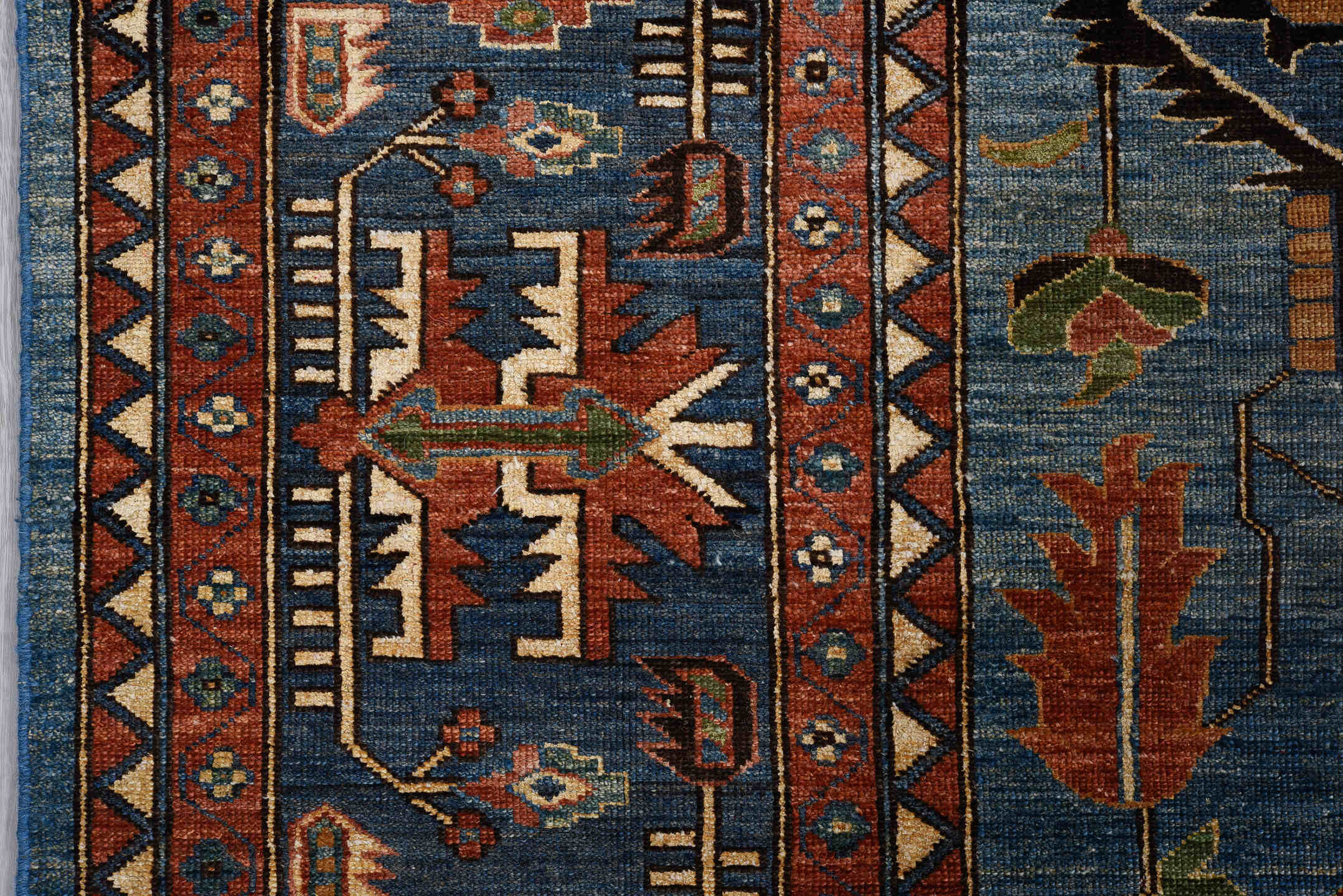 8' x 11' one-of-a-kind handmade vintage Afghan large size rug. Color palette: blue, rust, ivory, navy, coral, camel, black