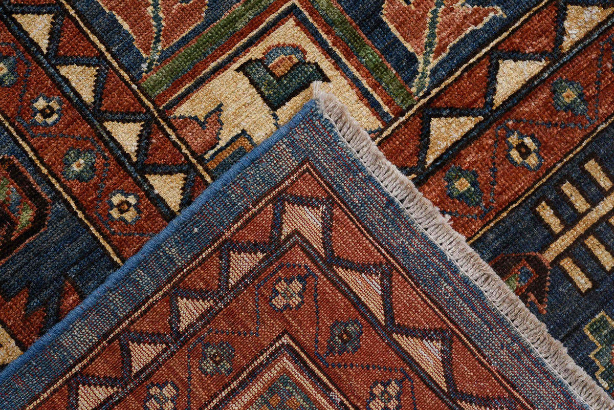 8' x 11' one-of-a-kind handmade vintage Afghan large size rug. Color palette: blue, rust, ivory, navy, coral, camel, black