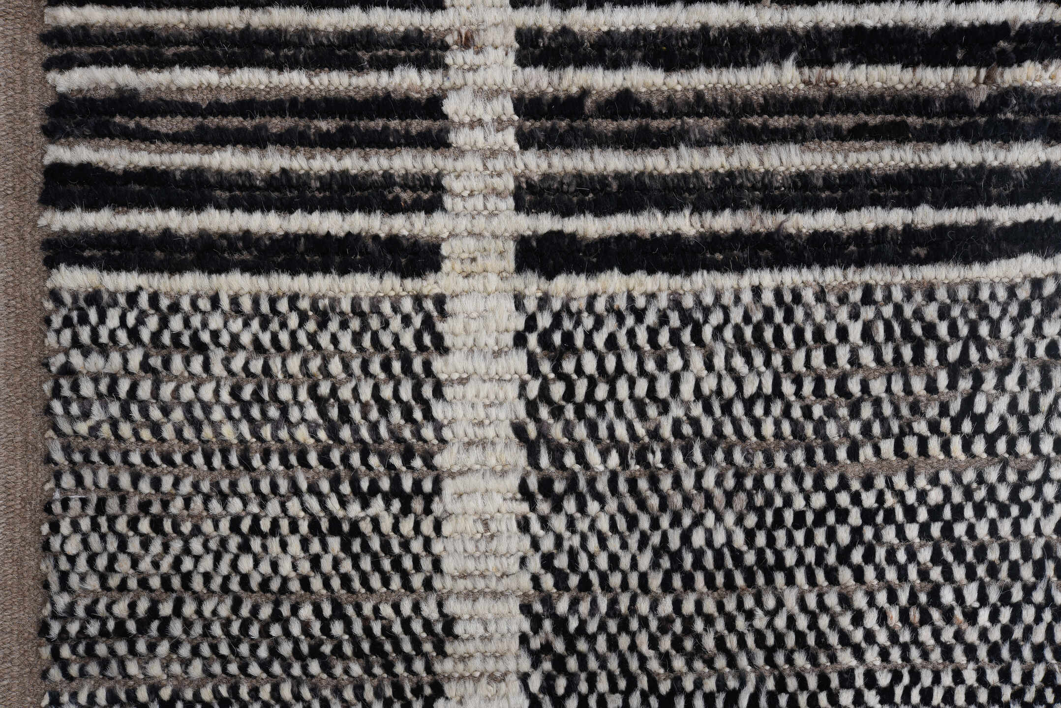 11' x 14' one-of-a-kind handmade vintage Tulu oversize rug. Color palette: gray, charcoal, ivory, black