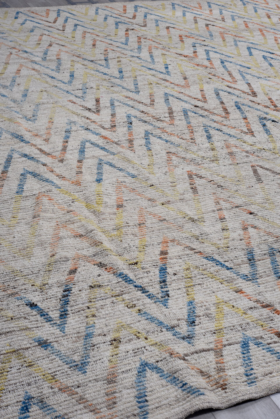 13' x 14' one-of-a-kind handmade vintage Tulu oversize rug. Color palette: ivory, sky blue, coral, yellow, taupe, brown