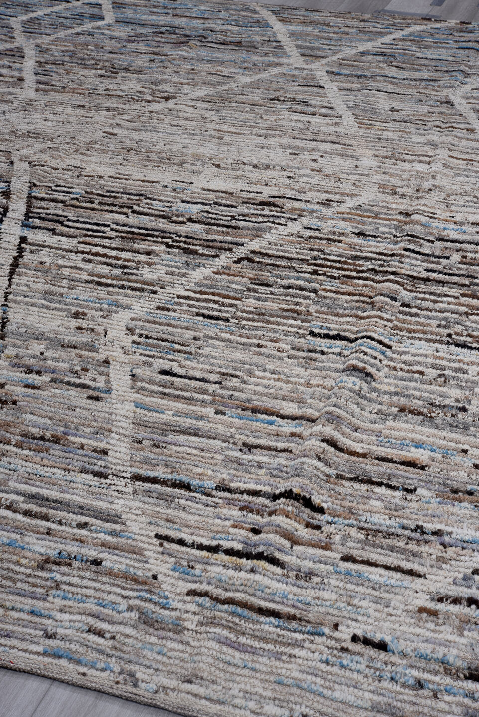 9' x 12' one-of-a-kind handmade vintage Tulu large size rug. Color palette: gray, ivory, taupe, charcoal, brown, sky blue