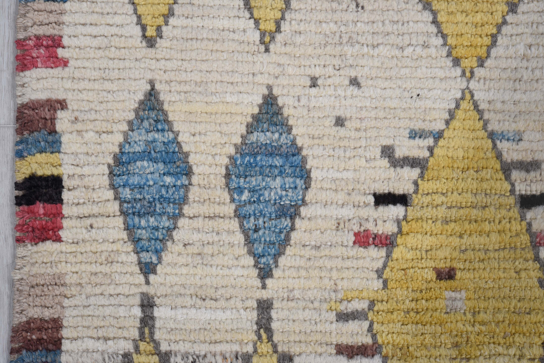 3' x 7' one-of-a-kind handmade vintage Tulu runner rug. Color palette: ivory, blue, gold, rose, black, taupe, pink, red