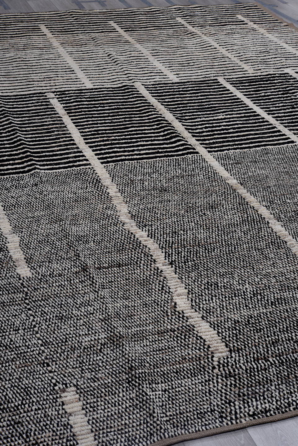 10' x 13' one-of-a-kind handmade vintage Tulu large size rug. Color palette: charcoal, ivory, gray, taupe, black, beige