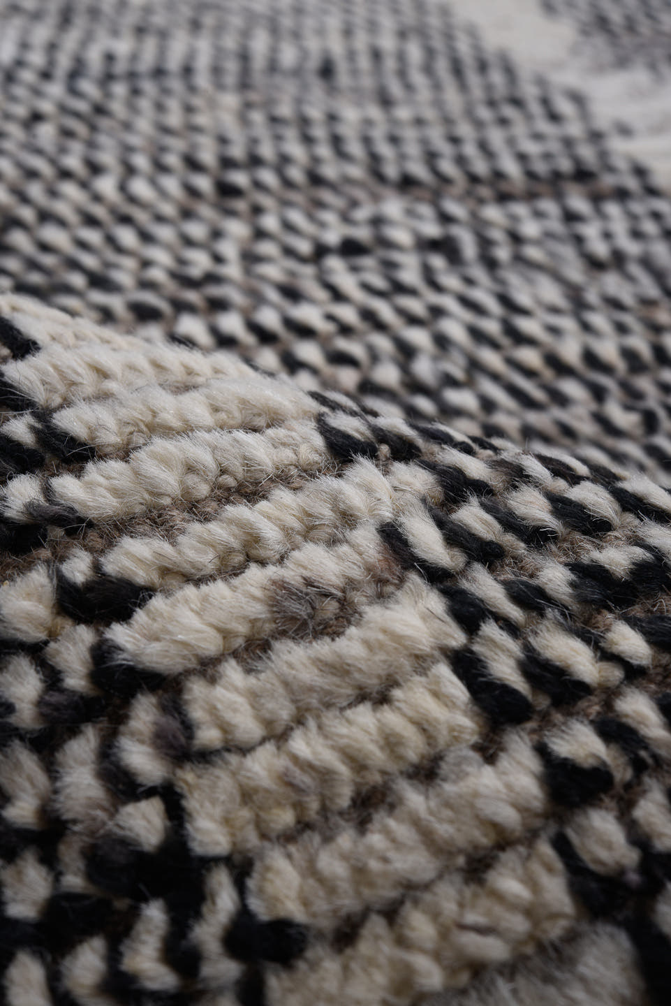 10' x 13' one-of-a-kind handmade vintage Tulu large size rug. Color palette: charcoal, ivory, gray, taupe, black, beige