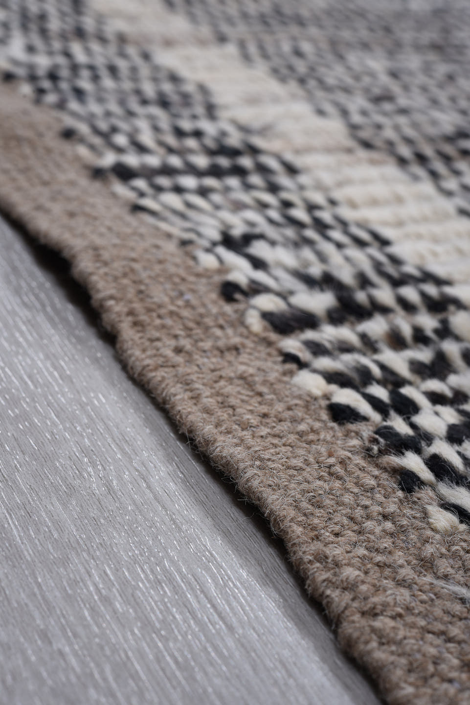 10' x 13' one-of-a-kind handmade vintage Tulu large size rug. Color palette: charcoal, ivory, gray, taupe, black, beige