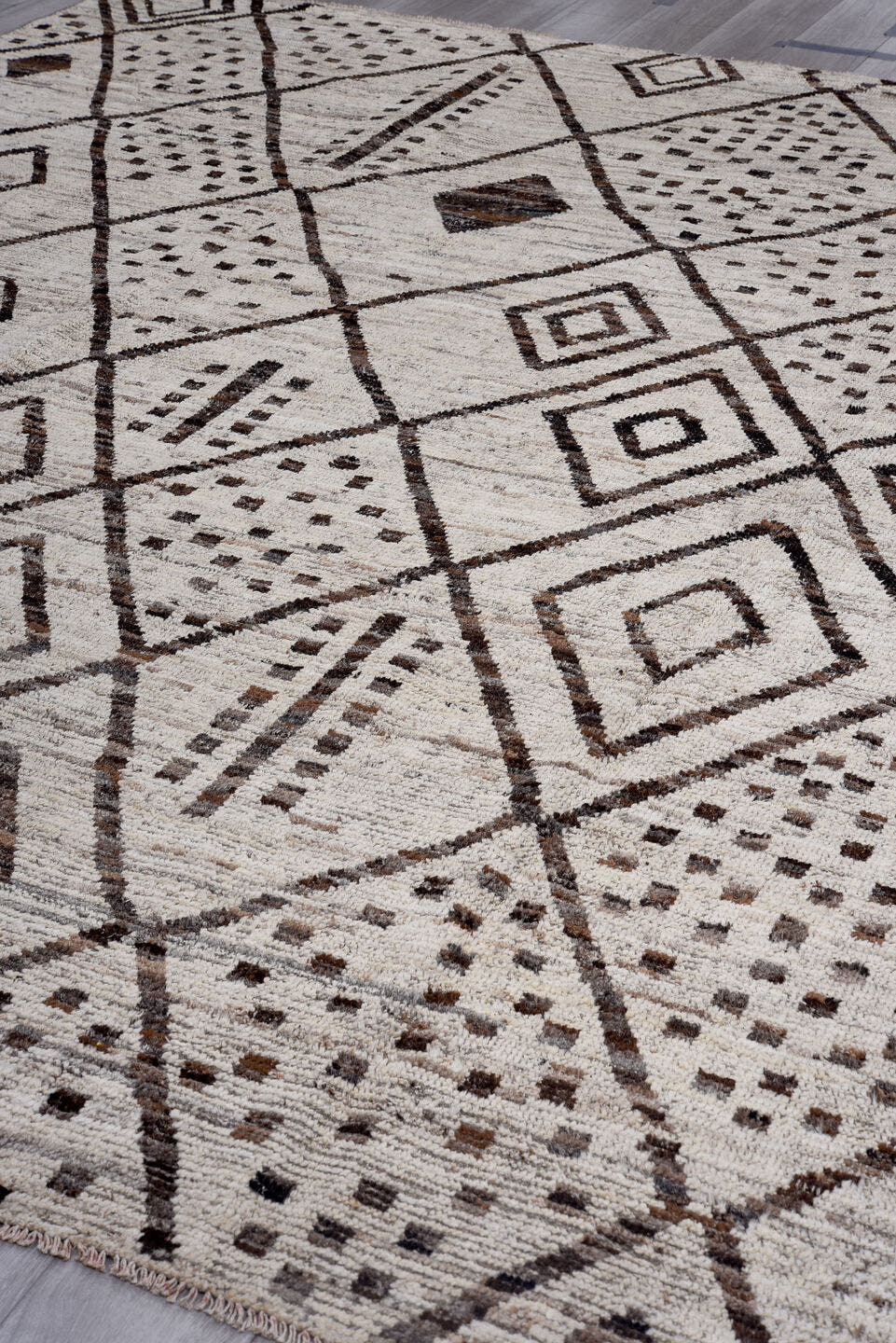 9' x 11' one-of-a-kind handmade vintage Tulu large size rug. Color palette: ivory, brown, taupe, charcoal, beige, gray