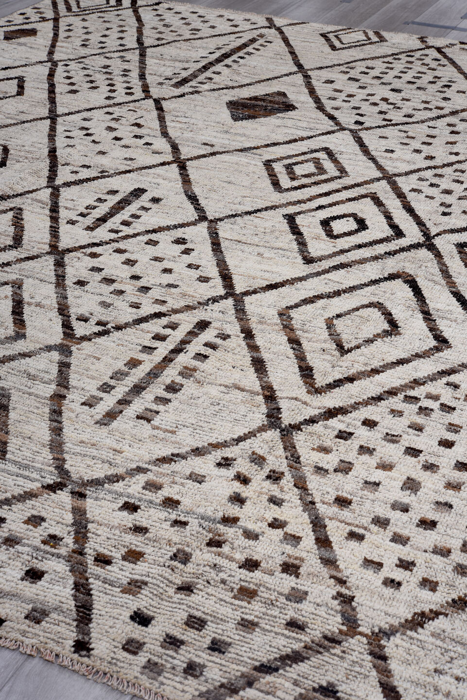 9' x 11' one-of-a-kind handmade vintage Tulu large size rug. Color palette: ivory, brown, taupe, charcoal, beige, gray